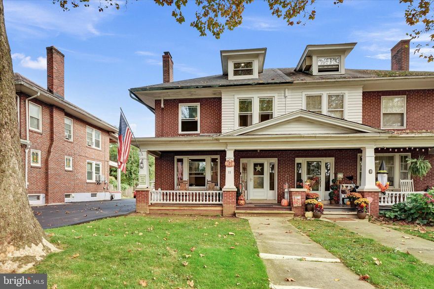Located on a beautiful tree lined street in the Wilson school district, sits 11 East Court Boulevard. This lovely brick home has had many upgrades and energy efficient features added in
just the past few years. The large welcoming front porch entails so much of the homes original charm. Step inside and stay warm next to the stone wood burning fireplace. This room
also features stained glass windows, custom built-ins, and hard-wood floors. The hardwood floors also flow through the sizable dining room which has tons of natural light and original
built-ins. Just steps away is the Kitchen which has plenty of storage space with a custom pantry and a high-end gas stove. On the second floor there are three nicely sized bedrooms with
ample closet space. There is also access to the large second floor covered patio that overlooks the back yard. The full bath has been completely updated with gorgeous details including a
tongue and groove pine ceiling and recessed lighting. On the third floor is a very large bedroom with additional room for seating or office area. In the basement of this home you will
find what I like to call a true masterpiece. The homeowner that is a qualified HVAC technician has removed the original boiler and installed a natural gas, wall hung, high end triangle
tube combination boiler. The supplies unless domestic hot water for those extra long showers "tubbies"and also provides the efficient hot water for the radiant heat. Many extras for
long boiler life and easy servicing. Also, the water has been softened and dechlorinated for long appliance life and personal use. And yes that is a functional toilet in the basement,
commonly referred to as a Pittsburg Potty .
The outdoor space is quite beautiful. The large back porch provides a great place to relax after a long day and watch the pets or kids play. There are two large garage is at the end of the
freshly paved driveway. Both garages have room for parking and additional storage space. This home has all new windows, a 2019 roof and so many other great features.