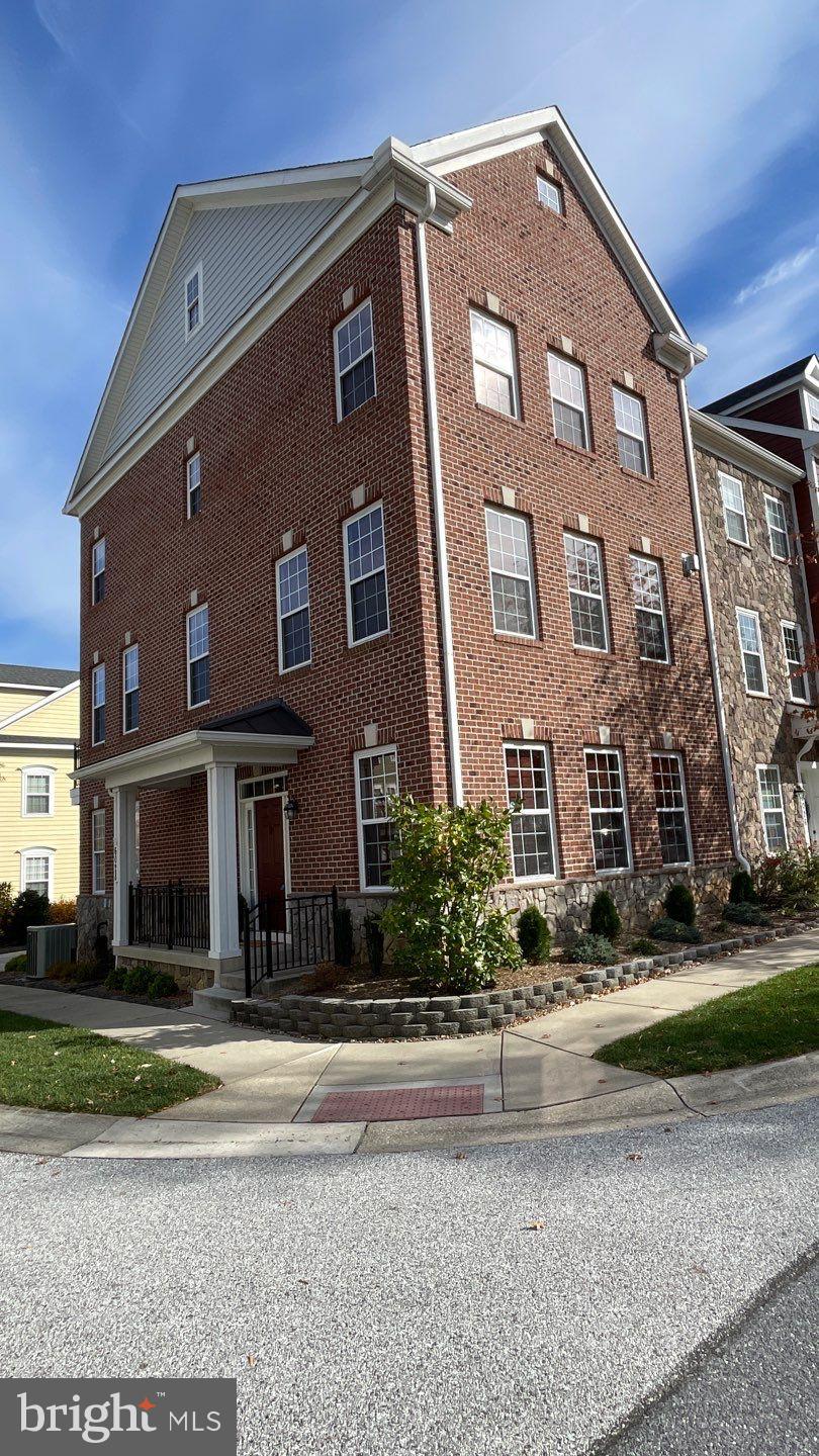 3 bedroom, 2.5 bath corner town home in Shipley's Grant! Beautiful brick on 3 sides! Brand new kitchen with extra large island and numerous cabinets/drawers. Newer refrigerator and dishwasher. A chef's dream kitchen! Hardwood flooring on main level. Carpet throughout the rest of the home. Gas fireplace in living room. Bozzuto built home. High grade finishes such as crown molding, tray ceiling in the dining room, & gas heat. Newly renovated kitchen with an extra large island with numerous cabinets and drawers. Newer refrigerator and dishwasher.Large 2 car garage with storage shelving . No lawn care needed. Shipley's Grant has 2 swimming pools in the community and club houses available to rent. Large play ground and play field close by. Walking distance to great restaurants. This one will not last long!