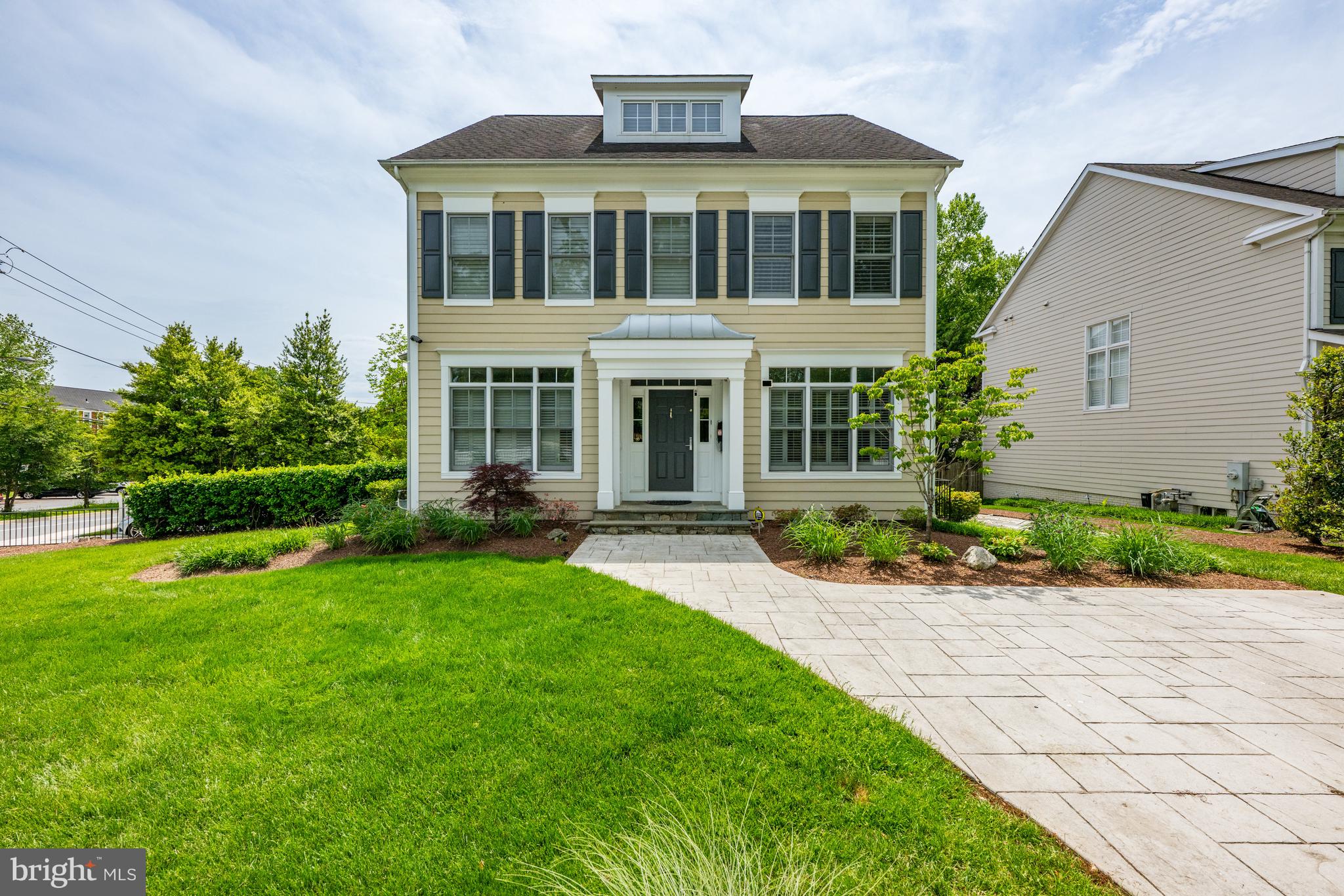 Adjacent to Edgemoor in Bradley Hills, this outstanding Downtown Bethesda location can’t be beat! Welcome to 5102 Manning Drive where you will be wowed by exterior the curb appeal, professional landscaping, large deck, front-paved courtyard, two-car garage plus parking for an additional eight vehicles; an open, flexible floor plan; four beautifully finished levels; sparkling eat-in kitchen with breakfast area adjacent to the family room; five bedrooms, including a spacious Primary Suite; four full baths plus a powder room.
The pillars on the covered porch are echoed in the welcoming foyer as well as the entries to the main areas of the first floor. The Living Room can double as a home office. The Dining Room boasts a bay window. The Butler's Pantry with glass-fronted cabinets above as well as below is adjacent to the Kitchen, which features a center island with stone countertop, beverage cooler, and seating for four. There are white cabinets with new black handles, granite countertops, and a tile backsplash, along with stainless steel appliances, including two GE self-cleaning wall ovens (one convection and the other conventional), GE refrigerator-freezer, GE dishwasher, GE downdraft four-burner cooktop, and a Kenmore microwave. The gas fireplace, with marble surround and hearth flanked by built-in cabinets and open shelving, is the centerpiece of the Family Room, which also has two sets of French doors to a Trex deck.
The second level offers three of the five Bedrooms, including the well-appointed Primary Suite. The large Primary Bedroom has a tray ceiling, a walk-in closet, and a large Dressing Room with closet that includes a center island with drawers, cabinetry and double hanging rods. A double-door entry leads to the Primary Bath featuring two separate vanities with granite counters, cabinets with drawers below, mirrors, and custom sconces above each. The oversized tiled shower has a muted glass door and wall, four niches, frosted glass windows, and a built-in bench with a second hand-held shower. There is a separate water closet. Two additional bedrooms, a hall Bathroom, and Laundry Room complete this level.
Level 3 has an Office/Loft with a door to the Utility Room, the fourth Bedroom, and third full Bathroom.
The lower level boasts a Foyer that leads to a large Recreation Room, Exercise Room or fifth Bedroom, fourth full Bathroom, and an unfinished Utility/Storage Room.
Additional special features include a fully integrated security system, newly refinished hardwood floors on the first floor, plantation shutters on most windows, and a fully integrated HVAC system.
The exterior of this fabulous home has a new asphalt shingle roof, white vinyl and wrought iron privacy fence, two large decks from which to enjoy the lovely, landscaped yard with new trees and shrubs.
All of this is located a stone's throw from Downtown Bethesda with its shops, restaurants, and entertainment offerings. The public schools are among the area's finest, and a number of excellent private schools are in close proximity. Metro is located a few blocks away, as is access to the Capital Crescent Trail. Traveling for work or pleasure? You'll enjoy easy access to major transportation routes as well as the area's three major airports.
If you are seeking a home that combines an open floor plan with an excellent use of space and so much more in the highly sought-after Bradley Hills neighborhood, this is it!