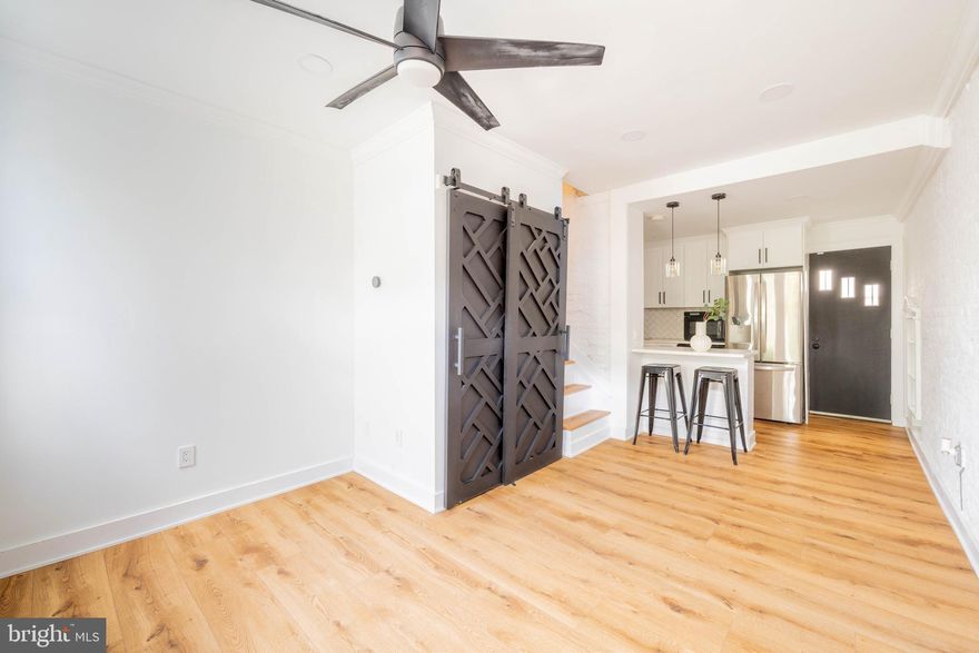 Stunning three story trinity with a roof deck, nestled on a beautifully maintained, tree lined street in the highly sought-after Pennsport neighborhood of South Philly. Step into a warm and inviting living room featuring hardwood floors, exposed brick, and an abundance of natural light. The open layout flows into a sleek kitchen with high-end stainless steel appliances — including a dishwasher and garbage disposal — custom cabinetry, and quartz countertops.

Upstairs, the second-floor bedroom boasts an oversized walk in closet with custom built-ins, a washer and dryer—because second floor laundry really is a game changer! The stylish bathroom includes a spacious rainfall shower with herringbone tile, a custom glass door, and high-end matte black finishes.

On the third floor, you’ll find another large bedroom with a beautiful custom accent wall that leads out to your private roof deck— complete with an outdoor shower. Just one block from scenic Jefferson Square Park, two blocks from Washington Ave, and close to local favorites like Charlie’s Roast Pork, Herman’s Café, Cake & Joe, and Pennsport Beer Boutique. Super convenient access to I-95, I-76, Columbus Blvd, and Center City! Pets allowed on case by case basis. Available May 1st!