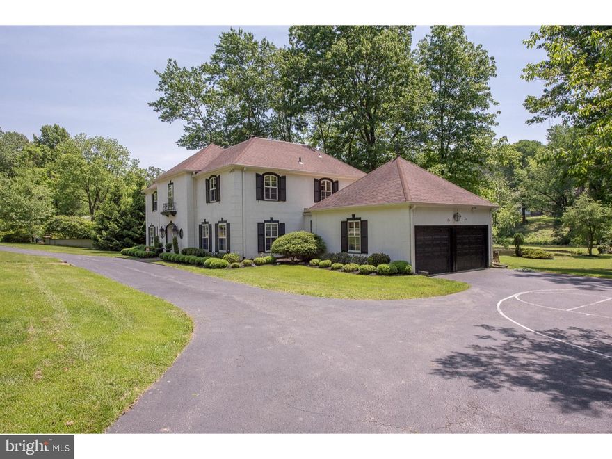 This lovely French Colonial is spacious with 5 bedrooms, 3.5 baths and is situated on 2 acres in NS Bryn Mawr, Lower Merion Township. Enter the home into a marble entrance hall off of which are the living room with fireplace, office, dining room, familyroom with a fireplace and kitchen. The updated Kitchen has a Subzero Refrigerator, gas cooktop, icemaker, warming drawer, island workspace and granite counter tops. The second floor has a spacious master suite with updated bath and dressing room. There are 4 additional bedrooms on this level and 2 additional bathrooms. There is a walk-up finished attic space for storage. The lower level is finished with a powder room and wet bar. This property is situated on a private road overlooking the neighbor's pond and tranquil backyard. This home offers a tranquil retreat.