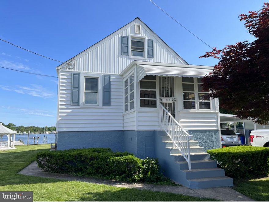 * Bear Creek Waterfront*
Amazing Waterviews! Views look across to Sparrows Point Country Club and Marina. 
1st time offered in 61+ years! 
3 Br 1.5 Bath Cape Cod with 75’ of Water frontage, Bulkhead and pier in great shape, 3 deep water slips, large ‘front yard’ with Gazebo. Perfect spot for eating crabs! 
Many recent updates:
New:
* Roof/Sheathing and architectural shingles
* Gutters and downspouts
* Beaded Siding 
* Awnings
* Carport 
* Windows
* All new flooring
* New Half Bath 
Main level: 
Living Room, Dining Room, Main Bedroom, Full Bath, Kitchen with breakfast nook and Island, Enclosed front and back porches. 
Upstairs:
2 Bedrooms
Downstairs:
Family room area, office area, half bath, Laundry, utility / storage room, extra storage under the waterside porch.
Storage under the roadside porch.
Home Generator