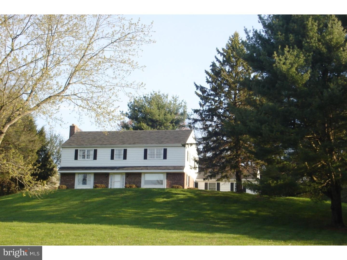 Step into this well built 2 story brick/aluminum siding home looking over 2.40 countryside acres.  The entire house has VERY LARGE rooms.  A wood burning brick fireplace with custom paneling and bookshelves is found in the family room.  A sliding door leading to the backyard is found this room also.  The dining room has  2 custom built corner cabinets and a glass chandelier.  In the massive living room you will find a built in speaker system and a large picture window for the view of the hillside below.  The eat in kitchen has an island, pantry, as well as all appliances are included.  Off the kitchen is the fully equipped laundry room, as well as an entrance to the backyard.  The attached 2 car over sized garage serves as an entrance to the full unfinished basement.  Upstairs features 3 massive bedrooms, full bath and a computer area off the hallway.  The master bedroom has 2 walk in closets and a tiled master bathroom.  This house is move in ready.  However, the carpets, paint, and appliances could use some updating.  Updates already made are new plumbing, AC/Heat pump and hot water heater in 2013.  Also, many newer energy efficient windows have been installed.  Come tour this beautiful lot and home and you will see the endless possibilities.  Available immediately.
