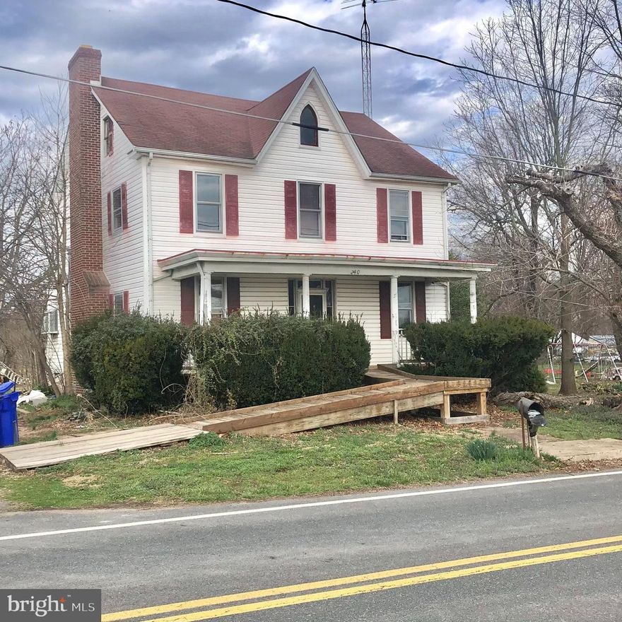 If it has been your dream to renovate an older Victorian home, now is your chance! This gem sits on 2.13 level acres just outside of Adamstown. It is convenient to major commuter routes and has no HOA! The home features a main level bedroom and 4 additional spacious bedrooms on the upper level.  There are two full baths and main level laundry. Also included on the main level is the kitchen, dining room and living room w/fireplace.  Huge, walkup attic could be finished for additional space. From the grand front porch, you can take refuge from the sun and enjoy the sunrise. The rear and side yards have plenty of space for leisure activities. There's an outbuilding for storing yard equipment or business equipment. The large driveway has space for all of your cars/recreational vehicles/guests.  Contact listing agent for lender options as property will need local portfolio financing, renovation financing or a cash buyer.