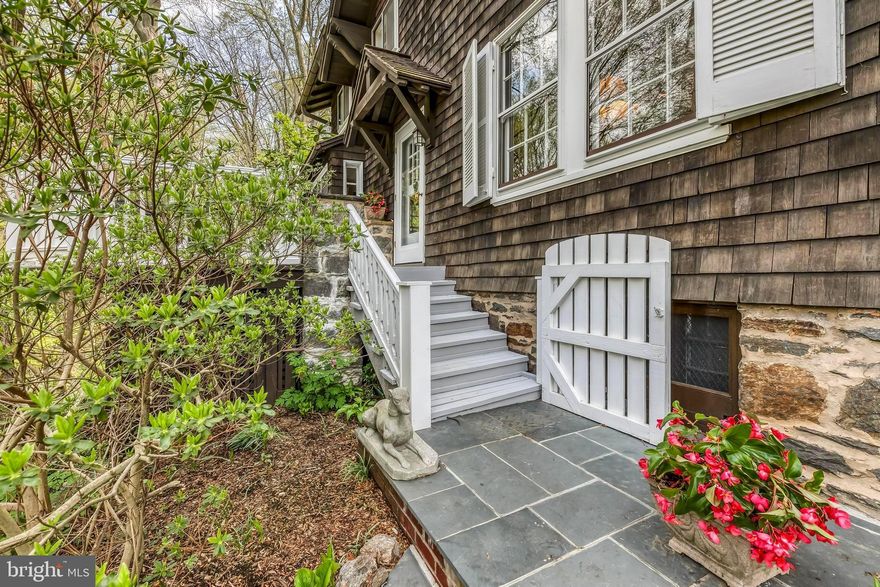 Enjoy privacy, natural beauty and a multitude of entertaining space in this remarkable retreat situated in a quiet location in popular Roland Park. This impeccably maintained light-filled 3BR/3BA Craftsman-style home is masterfully updated and offers a blend of yesterday s fine finishes and architectural detail with today s desired amenities. Features include a formal living room with wood burning fireplace adjacent to sunroom opening to rear terrace and a formal dining room with bay window. The light-filled white kitchen opens to rear kitchen garden and features granite counters, stainless appliances and a gas cooktop. The partially finished basement includes media/fitness room, full bath, laundry and generous storage. Exterior elements include rear and side wraparound bluestone terraces, stone walls, tiered gardens, and an expansive front entry deck. Perennial border gardens with specimen evergreen shrubs and exquisitely maintained towering trees provide habitats for native plants and wildlife. Neighborhood sidewalks lead to popular walking paths and streams. A truly unique and beautiful property located just minutes to downtown Metropolitan Baltimore.