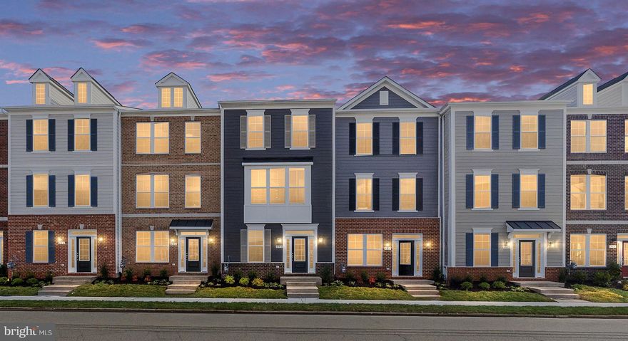 Discover Mary’s Landing, a new construction townhome community in the heart of Fredericksburg. These modern three-level homes with two-car garages combine style, space, and low-maintenance living just minutes from downtown shops, dining, and the Rappahannock River. Enjoy historic charm, outdoor recreation, and convenient access to I-95, Route 1, and the VRE—making commuting simple and weekends full of possibilities. Step inside the Upton on the lower level, where a you will find a welcoming foyer from either the front entry or the rear two-car garage. In addition, you will find a main level bedroom and full bath. On the second level, the Upton shines with an open-concept design. The spacious family room provides plenty of room for relaxation and entertaining, with the option to add a cozy fireplace as a focal point. The adjacent kitchen is the true centerpiece, featuring a large island, ample counter space, and a dedicated dining space. Extend your living space outdoors with the optional sliding glass door and rear deck—perfect for morning coffee or evening gatherings. Upstairs, the Upton continues to impress with three bedrooms, two full bathrooms, and convenient bedroom-level laundry. Two secondary bedrooms share a hall bath, while the private primary suite offers a walk-in closet and a luxurious bathroom complete with dual sinks and a walk-in shower. The Upton is more than a townhome—it’s a home designed for modern living, offering the flexibility to adapt to your lifestyle today and for years to come.