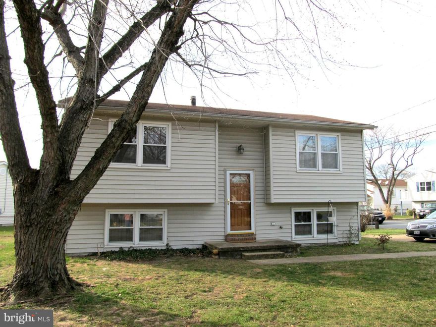 Lovingly maintained split foyer on corner lot!  Beautifully renovated kitchen with granite counters, SS appliances and loads of cabinet space.  Gorgeous wood floors!  Deck off kitchen for outside barbecuing!  Master bedroom with super bath!  Pack your bags!  Move-in ready!!