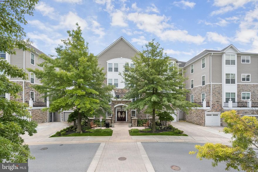 Welcome home to this stunning two-bedroom, two-bathroom condo with in building, private garage almost directly below the condo, offering over 1,600 square feet of luxurious living space in the highly sought-after Quarry Lake.The parking garage has plenty of room for storage!! As you step inside this sun-filled retreat, you are greeted by an expansive living room featuring a tray ceiling that provides an elegant touch to the space. Cozy up in the den or host gatherings in the dining room, perfect for entertaining guests or enjoying quiet evenings at home. The eat-in kitchen is equipped with stainless steel appliances, granite countertops, and a charming breakfast nook for casual meals. The full size pantry was added in the kitchen to make sure there is no shortage of storage space!! Retreat to the primary bedroom suite, complete with a walk-in closet and private en-suite bathroom that has a walk-in shower. The second bedroom, second full bathroom, and laundry room finish this terrific home. Experience maintenance-free living at its finest, with the added convenience of a private garage for parking and storage. Enjoy the wonderful community amenities including a security gate and the Lakeshore Club community center with an outdoor pool, fitness center, tennis courts, and more. Conveniently located in Quarry Lake, you will have easy access to a plethora of shopping, dining, and entertainment options. Plus, with quick access to major highways 695 and 83, commuting to work or exploring the city has never been easier. Previous contract fell out due to pet weight restriction. **Please note: the Condo Docs limit homeowners to have 2 domestic pets and they shall not exceed 30 pounds each.**