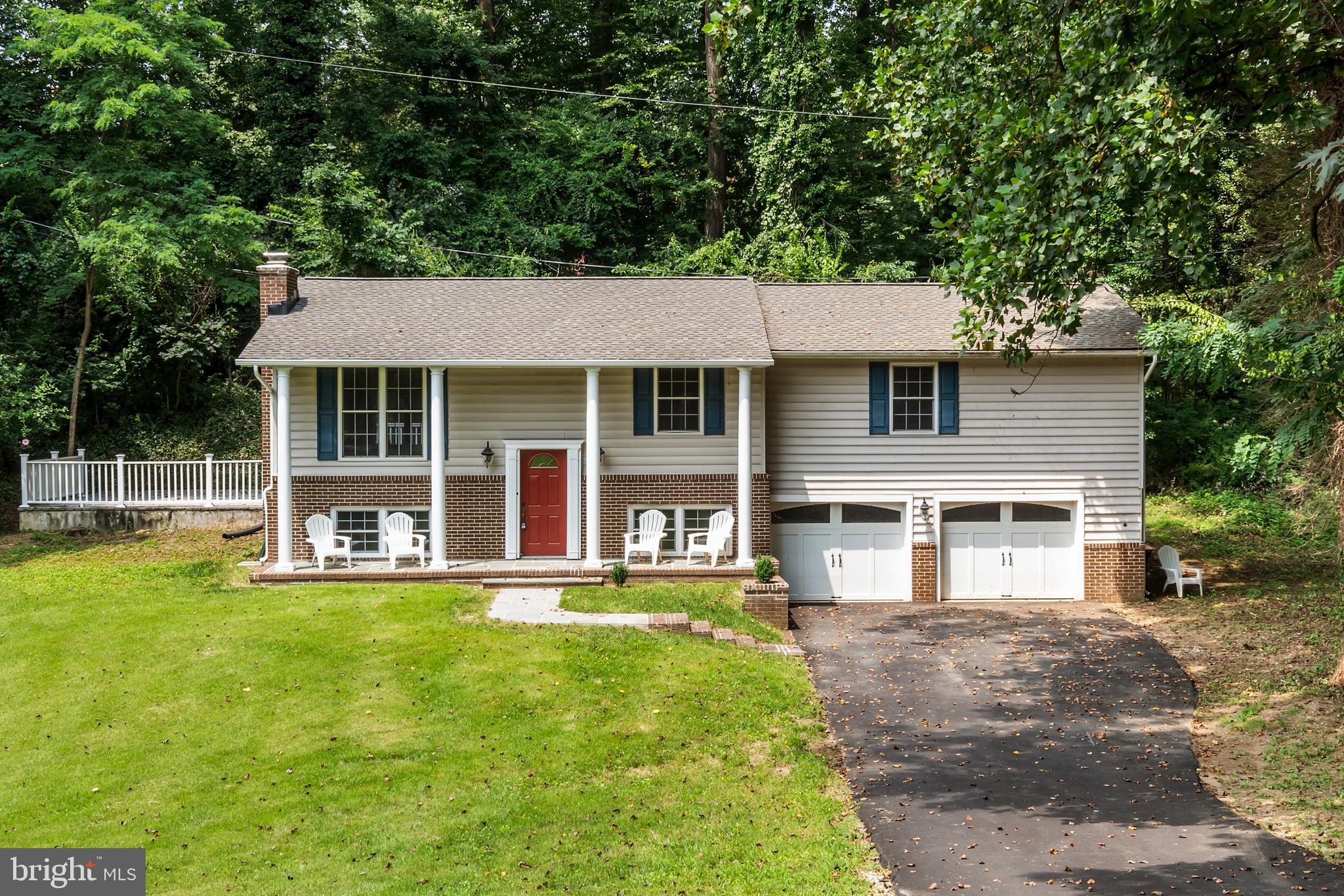 Stunning 4 BR/3 FBA home in the sought after Indian Hills community. Come see all these great renovations - New Roof - 30 yr arch shingles, 2024 HVAC, Open Kitchen with Quartz Island & counters - white cabinets, Hardwoods refinished and stained upper level, lower level LVT, mudroom/laundry room, house freshly painted, Trex deck & fence, asphalt driveway, flagstone walkway & front porch. This home offers 3 bedrooms upstairs with 2 full baths - primary bedroom has been extended with extra space for sitting area/desk and walk-in closet. The lower level has all new LTV and wood burning fireplace, 4th BR and full bath, extra-large 2 car garage. Anderson windows - 2 downstairs new and house 5 yrs. Enjoy all the amenities Indian Hills has to offer - Clubhouse, Pool, basketball, tennis court, playground and picnic area.
