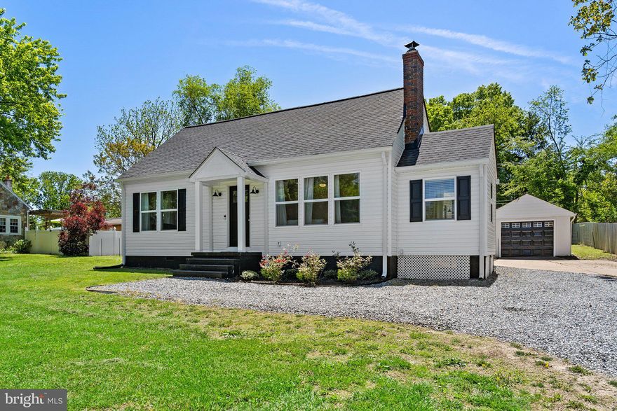 LOOKIN' GOOD IN THE NEIGHBORHOOD! Set in an ultra-convenient location, close to a full range of local amenities. Upon entering this home, immediate attention is drawn to the warm & relaxed feel. The home features beautiful hardwood flooring throughout the main level! The current owners have replaced the HVAC in 2021. The previous owners remodeled this home inside and out! The roof and siding were replaced. The kitchen and bathrooms were remodeled! There are two main-level bedrooms and two bedrooms on the upper level. Both levels have a full bathroom with tile flooring, updated vanities, and upgraded showers! The upper-level bedroom flooring is carpeting.  Neutral paint, neutral finishes, fresh and clean look throughout! Single car detached garage (12x22).  Welcome Home!!