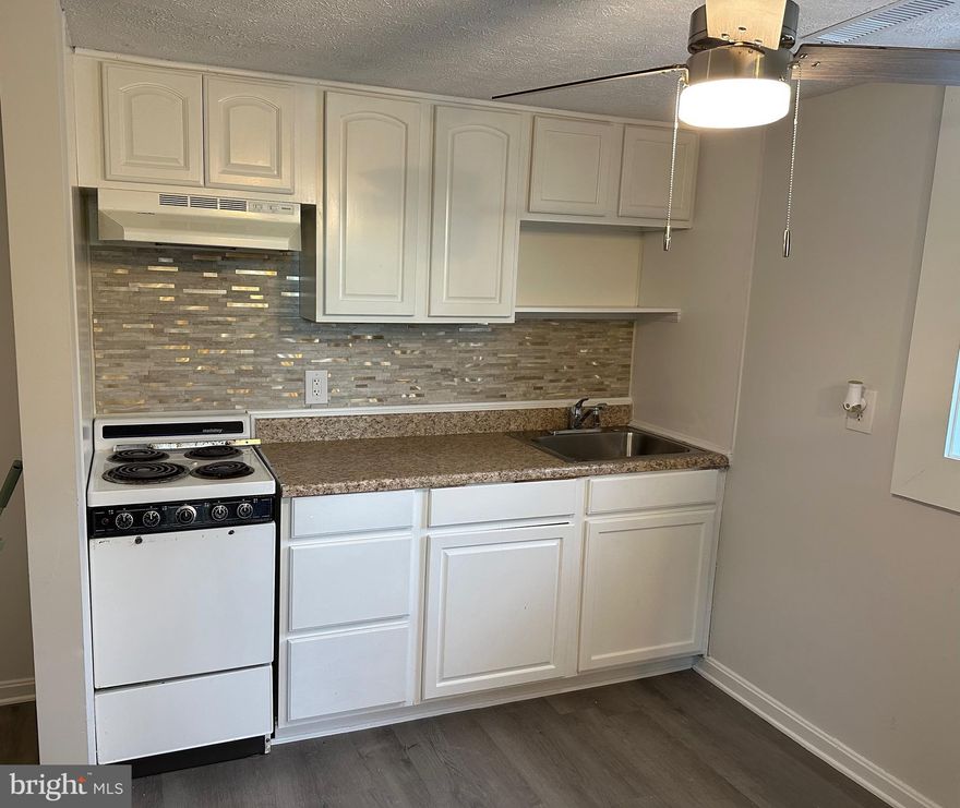 Great Location ****2 Bedroom apartment located above retail space... Updated and ready to move in.   Priced right..  Wonderful space for the area with washer & dryer.... Plenty of parking .  Entrance on right front of the retail building.. go in and up the steps to the Beautiful space.......Fresh paint.. new flooring and ready to move in. Unit #3