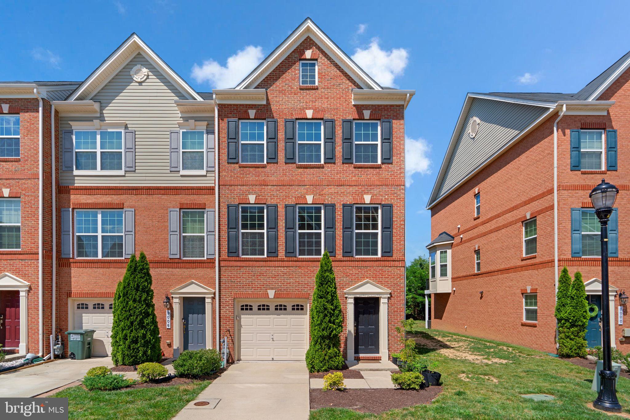 Gorgeous Brick Front, End Unit townhouse, 3 fully finished levels, 3-Bedroom 2 Full & 2 Half Bath with Attached 1 Car Garage and non-maintenance Composite large Deck in Howard County's Blue Stream community. The Main Level features a Foyer with a Hardwood floor and offers a large living space that can be used as a Living/Entertainment room or as a home office with a Half Bath, access to the garage, and sliding glass door access to the rear yard. Walking to the second level, the abundance of living space cannot be beat, including a dining space that leads to the maintenance-free deck, all separated by a center-loaded kitchen. Featuring an oversized kitchen island, Stainless Steel appliances, beautiful cabinetry, granite counters, and ample cabinet space for all your culinary needs. This kitchen has a very open floor plan to entertain dinner parties or prepare meals, and this kitchen is perfect for all skill levels. Upstairs welcomes with a luxurious primary bedroom suite with a spacious walk-in closet, bathroom featuring upgraded dual vanities, and an oversized tiled shower. The two other bedrooms on this level offer generous closet space, which also share the Hallway Bathroom. Laundry on the bedroom level makes life easier with the washer and dryer. This well-maintained, beautiful home is conveniently located with easy access to shopping, dining, parks, and commuter routes.