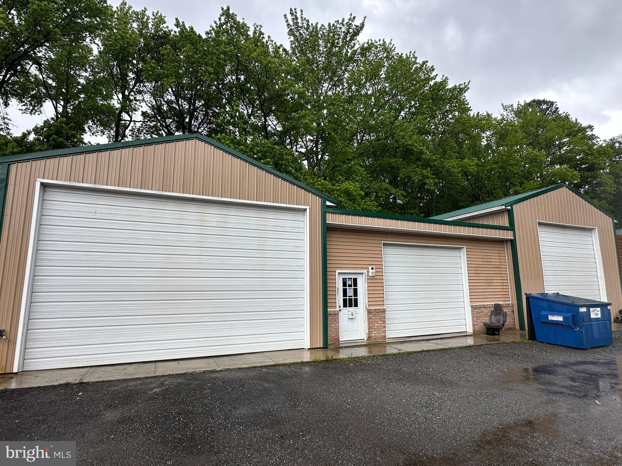 Former automotive shop available in a prime industrial park with excellent access to Easton, Trappe, and Route 50. This functional, multi-bay unit features three drive-in overhead doors, ample garage space for vehicle service or storage, a front office area for administrative use, and a private bathroom. Ideal for mechanics, service businesses, or any operation needing a turnkey automotive-ready facility with room to grow.
