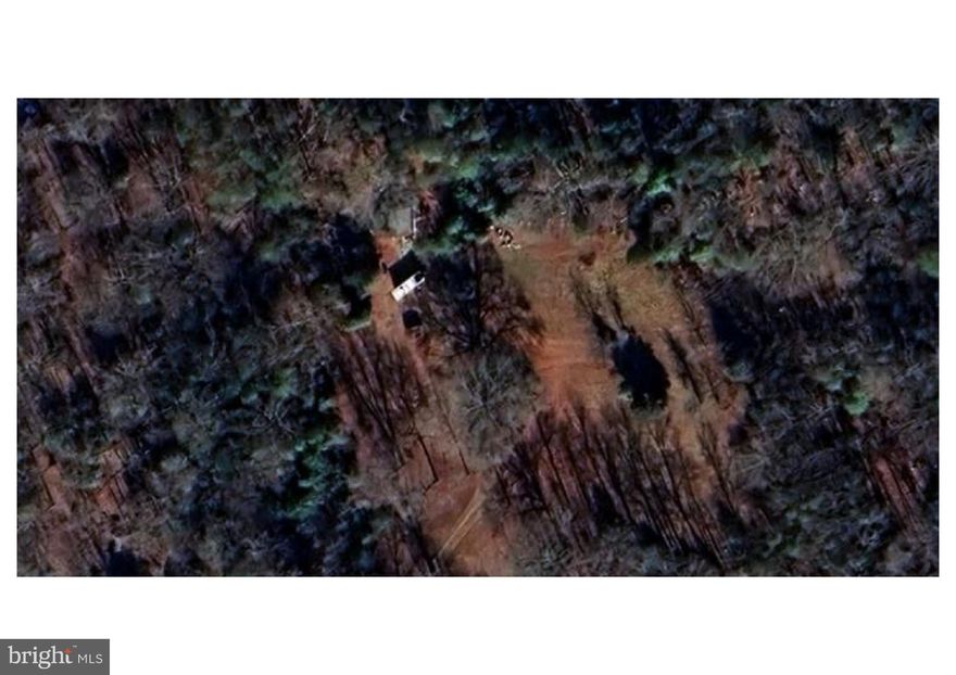 Make this your new homestead! Nearly 4 acres of raw land offering endless possibilities and New Build potential -.  No perc or septic currently in place. Shared driveway. Potential well on site (buyer to verify). 
This is an estate sale, and the seller will consider all reasonable offers. Very Private location!