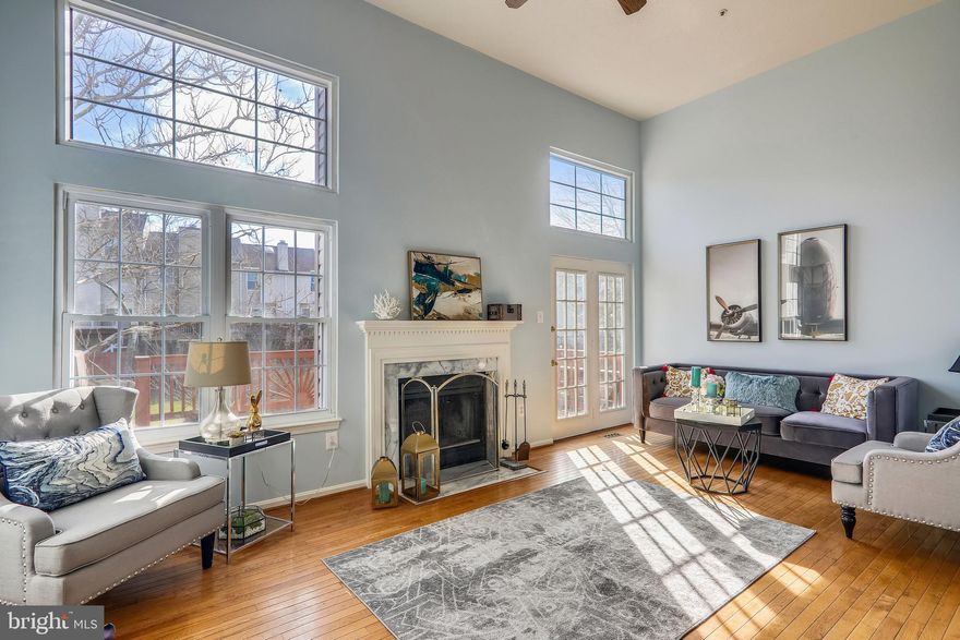 Please use rentspree link to apply. Come and fall in love with this lovely gem of high ceiling three-level townhouse, it has all you’ll need!  It has an open concept living area surrounded by sun-filled bay windows and an elegant fireplace.  You will enjoy lounging and welcoming your guest in its spacious area.  A marble foyer and hardwood floor on the main level add to the value.  A large and well-lit kitchen window creates your ideal ambiance while you cook.  The large bedrooms upstairs are Berber-carpeted, with the newly upgraded master bathroom. Convenience is at its best when you have a toilet located on each floor.   When you need to get away for the day, the retreat of the fenced backyard with patio and deck overlooking the open space and tree lines provides a peaceful and serene escape. It has a walk-out basement with sun-lit windows, as well as very convenient access to major commuter routes.  You are just minutes away from major shopping and dining in Greenbelt with Free bus transportation to the University of MD campus, minutes away to the shopping center, Rd 193, I-495, and I-95.  You don't want to miss out on this amazing home. Schedule a showing now before it's too late!