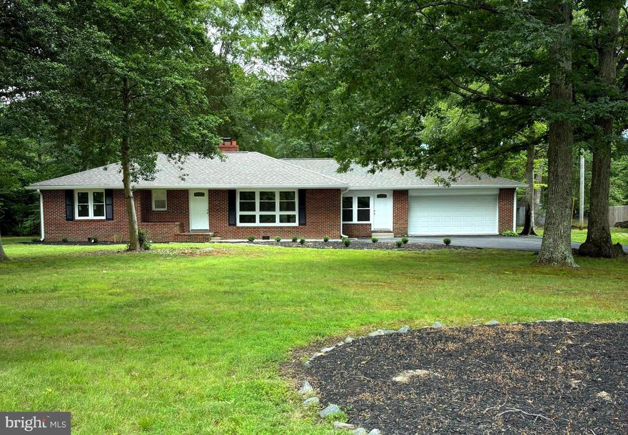 Contract fell through --------------------------------------------------
CONTRACT MUST REFLECT "PENDING SEPTIC SYSTEM INSTALLATION"... seller is expecting about 30 days  **  House has just been totally remodeled-BEAUTIFUL !!!!!  Large living room ** Large eat-in kitchen **
Family room or possible 4th bedroom **    Built-in bookshelves ** Family room **  One working Fireplace ** 
Two entrances
** Looks brand new **  Large yard---great for entertaining.  2 car garage  **   ** A Lot for the money **    PLENTY OF PARKING **