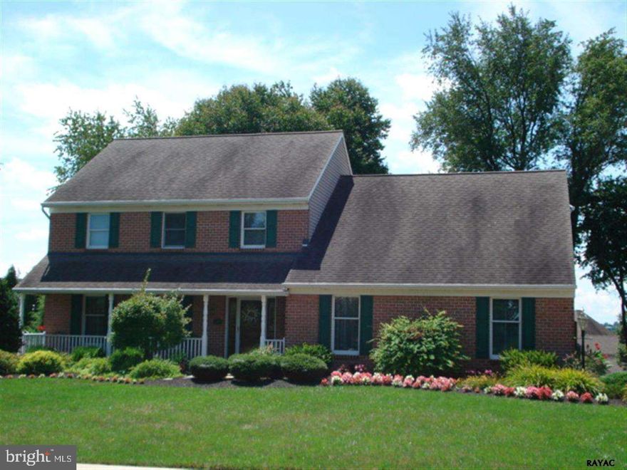 Curb appeal to the max & lovingly maintained, this 4 BR, 2.5 BA, brick colonial will delight you! Lots of windows and natural light. Spacious oak kit w/island/bkfst bar open to FR & sliders to deck and wonderful yard. Huge master suite w/window seat, 2 walk-ins and master bath w/whirlpool tub and seperate shower. Walk-out basement has great rec room potential.