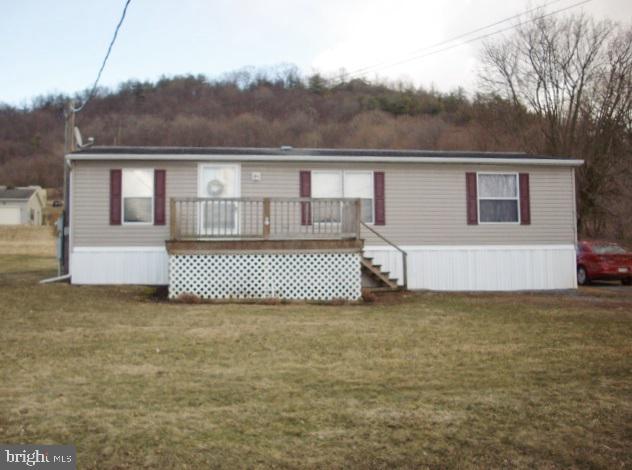 2004 Fleetwood doublewide w/ 3 bedrooms & 2 full baths. Central air. Kitchen appliances included. Curtains & blinds included. Propane fireplace. Storage shed. Public water & sewer.