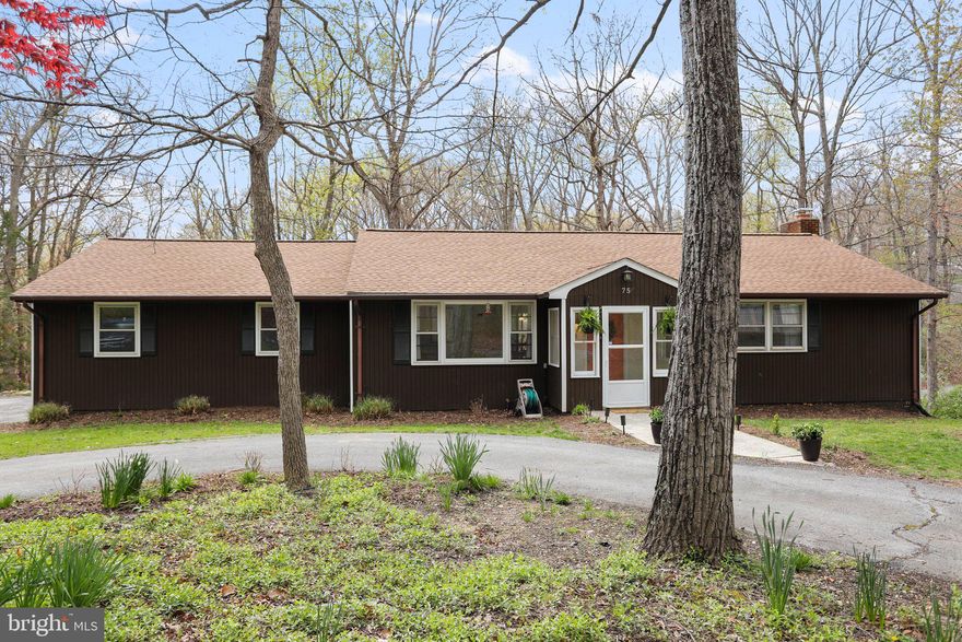 A remarkable find that won't last long! Nothing to lose in this updated and well maintained home. New Roof and Gutter Guards installed in 2021, fresh paint on the main level, PLUS a home warranty that goes with this sale. This open floor plan home has storage galore, hardwood floors, and an updated kitchen boasting granite countertops and stainless steel appliances. Both levels have a 4-Seasons room (Florida room) overlooking the private backyard with mature trees. The lower level has a hot-tub room, large family room with bar and kitchenette, as well as a working gas fireplace. The property has an attached 2-car garage, a dream enclosed garden, storage shed with electric, and is complete with stamped concrete walkways, a patio and a fire pit.