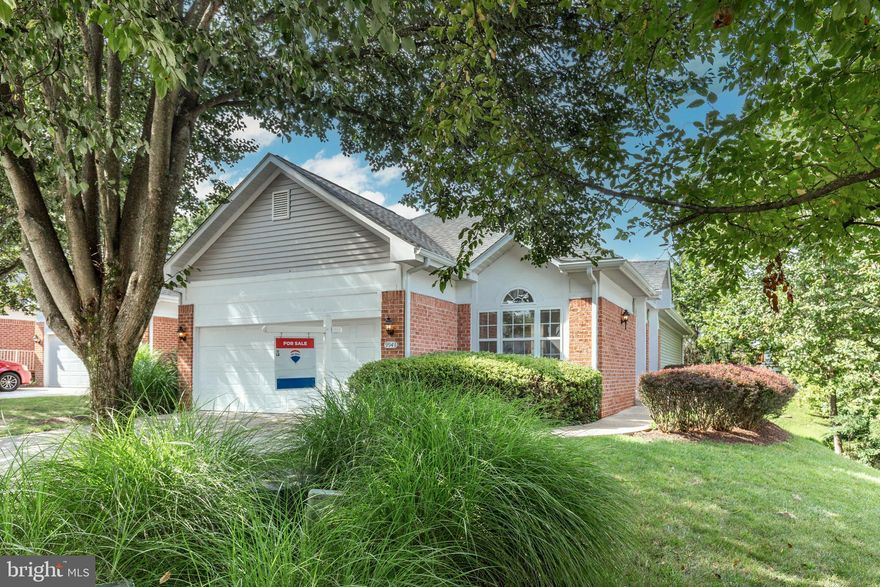 This fabulous 4-bedroom detached rancher is being offered for the first time in this beautiful gated community! The main level features a spacious eat-in kitchen with a patio door that opens to a private deck and a convenient entrance from the 2-car garage, as well. The kitchen offers four separate closets—one for laundry, 2 large pantries, and a utility/storage closet—and is large enough to accommodate an island or breakfast bar, being 3 feet larger than many other models. The primary master suite features two walk-in closets, with one being particularly spacious, and a luxurious en-suite bathroom equipped with a walk-in shower, soaking tub, double vanity, and a linen closet.  
The owners were mindful of creating more usable space when this home was built..Their design allowed for the removal of a hallway to the Master Suite and rearrangement of the entrance door to enlarge one of the walk-in closets. Their design in the Kitchen also increased the square footage by 3 feet, which allowed for the additional closet space and living area.
The large family/dining room area opens out to a private deck, perfect for entertaining. The owner has completed extensive grading, seeding, and upgraded drainage to the rear yard, creating much more usable living space and privacy to enjoy outdoors. The main level also includes two additional large bedrooms, another full bathroom, and ample living space. 
The walk-out lower level boasts a sizable bonus family room leading to a rear patio, along with a second primary suite featuring two closets and an attached full bath with dual vanities and a separate shower—ideal for an in-law suite or separate living quarters. An additional utility, storage, and workshop room completes this versatile lower level. This home combines comfort, style, and functional spaces for the perfect family retreat. Tons of natural light! Freshly painted and featuring new carpet throughout, this unique home is move-in ready!