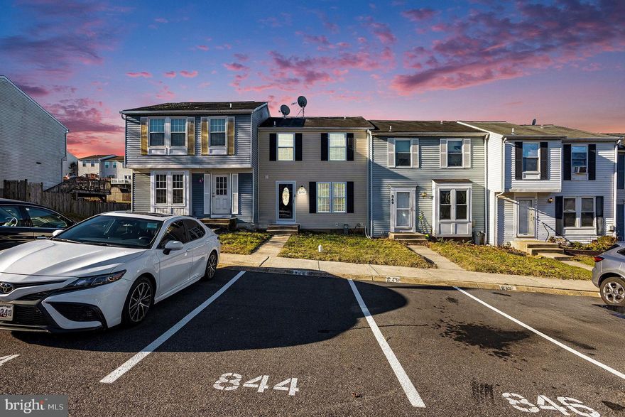 This charming contemporary townhouse in the desirable Woodbridge community offers a perfect blend of comfort and convenience. With three spacious bedrooms and one and a half bathrooms, this home is designed for modern living. The heart of the home features a traditional floor plan with an eat-in kitchen, equipped with essential appliances including a dishwasher, electric oven/range, and refrigerator, making meal prep a delight. The interior boasts beautiful hardwood flooring throughout, creating a warm and inviting atmosphere. The full unfinished basement provides ample storage or the potential for future expansion (including a bathroom rough-in), while the assigned parking spaces ensure easy access. Deck off the kitchen provides a nice space for relaxing or entertaining.  Step outside to enjoy the community amenities, including a fenced-in, in-ground pool perfect for summer relaxation. The well-maintained sidewalks invite leisurely strolls through the neighborhood, fostering a sense of community. Conveniently located with easy access to Route 40, Route 24, and I-95. The association fee covers essential services such as bus service, common area maintenance, and snow removal, enhancing your living experience. With major renovations completed in 2022, this home is in excellent condition and ready for you to make it your own. Embrace the lifestyle that Woodbridge offers, where comfort meets community.