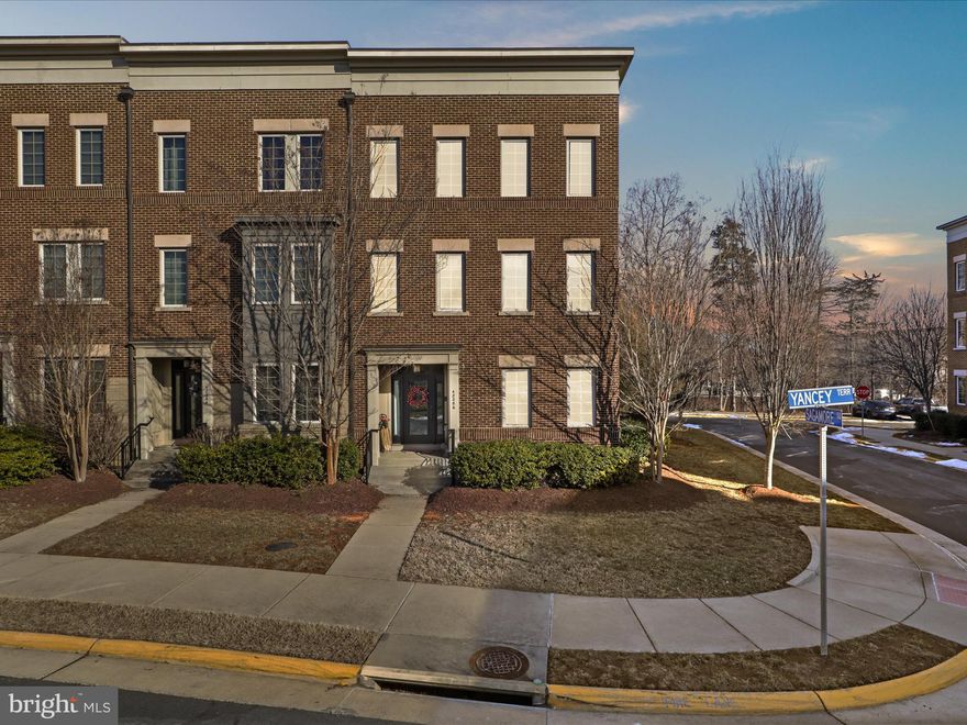 OPEN HOUSE SUPER BOWL SUNDAY NOON - 2PM***Discover the perfect blend of comfort and elegance in this move-in-ready end unit townhome by Miller and Smith. Just moments away from the vibrant Brambleton Town Center and situated against a serene, park-like backdrop, this home offers both privacy and enjoyment. The meticulously maintained Pierpont model features an impressive array of upgrades, providing ample space for living, working, and entertaining.  As you enter, you’ll be greeted by stunning French doors that lead to a spacious home office, which can easily double as a bedroom. This level also includes a full bath and a generous living area, perfect for a family room, additional office, or gym. Ascend to the upper floor, where the open-concept kitchen flows seamlessly into the family room and dining area, making it an ideal space for gatherings. The kitchen is a chef's dream, boasting upgraded cabinetry and a large granite island. The double-sided fireplace connects the family room to the outdoor patio, while wide plank flooring and abundant windows create a casually elegant atmosphere. 
The third floor showcases a luxurious master suite with an upgraded ensuite bath and walk-in closet, alongside two additional bedrooms, each featuring walk-in closets, a second full bath, and a spacious laundry room equipped with a utility sink. The oversized two-car garage provides plenty of room for your vehicles and additional storage. Enjoy maintenance-free living, as lawn care is included in the Brambleton HOA fee, which also covers Verizon FIOS internet and cable!  Step across the street to indulge in the diverse offerings of the Brambleton Town Center, including shopping, dining, the farmers market, One Life Fitness, the library, and Harris Teeter. For those seeking adventure, Beaverdam Reservoir is less than a mile away, offering opportunities for kayaking, paddle boarding, or simply enjoying the scenic views