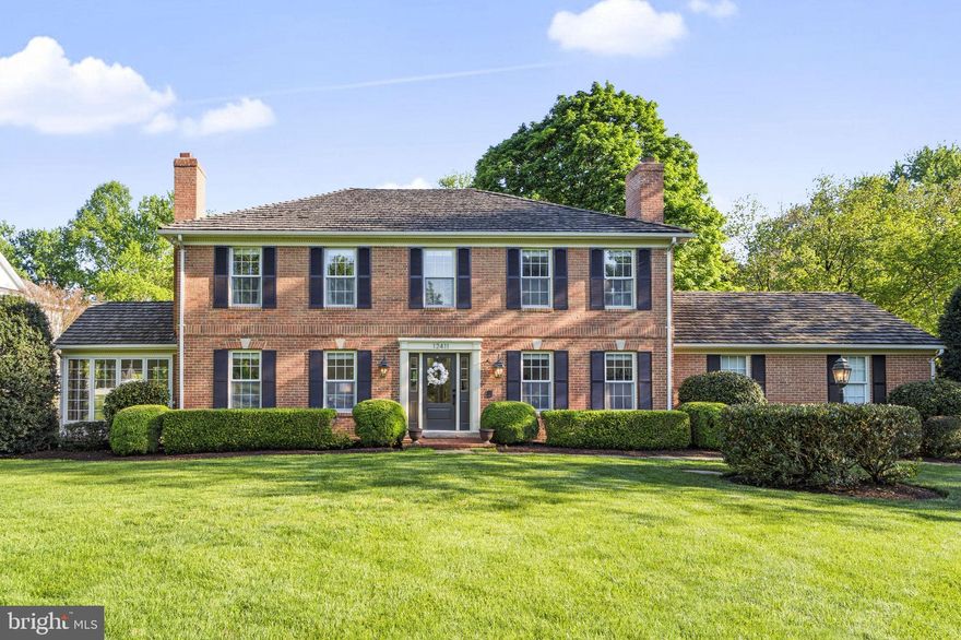 Introducing this stunning 5-bedroom Colonial-style home, nestled in the cherished neighborhood of Beaufort Park in southern Howard County. Surrounded by the Patuxent River Watershed Conservation Park and the serene Patuxent River and Rocky Gorge Reservoir, this home offers a rare blend of sophistication and tranquility. Meticulously crafted, this custom-built four-sided brick residence showcases impeccable quality and exquisite design features throughout. The main level welcomes you with a beautifully updated eat-in kitchen, boasting newly installed hardwood flooring, pristine wood cabinetry, a walk-in pantry, marble countertops, a cooktop, and newly installed stainless appliances including double wall ovens and a wine fridge. A cozy family room with a wood-burning fireplace, a formal living room with a wood-burning fireplace, and a formal dining room both with pristine hardwood floors, and a charming sunroom with an exposed brick wall offer inviting spaces for relaxation and entertainment. Upstairs, leads to a spacious primary suite with two walk-in closets and an ensuite bath w/soaking tub, along with 2 additional bedrooms and a hall bath. The lower level features 2 more bedrooms, a spacious recreation room with another fireplace and bar. Additional highlights include detailed millwork a new oil tank, Pella windows, central vac, a classic wood cedar shake roof (2015), HWH (2018), a well pressure tank (2012), and a 2-car garage with a workbench and service door to the rear yard. Outside, the expansive . 92-acre level lot is adorned with lush landscaping, mature trees, a blue stone patio, and stone pathways, creating an oasis for outdoor enjoyment. Located on a peaceful cul-de-sac street, this move-in ready gem offers the perfect blend of comfort, elegance, and convenience with easy access to Maple Lawn shopping and dining and nearby commuter routes. Don't miss the opportunity to make this brick beauty your own!