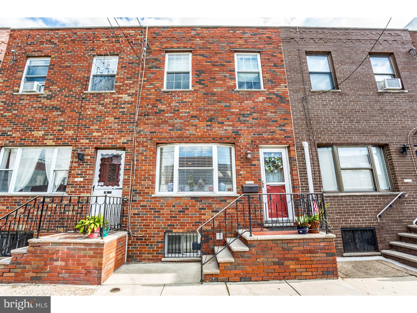 This beautiful red brick rowhome sits on a quiet street in the desirable East Passyunk neighborhood and boasts 3 bedrooms, 2/1 baths, a finished basement, and private patio with garden bed! Enter into a spacious open floor plan with tiled floors and high ceilings with recessed lighting. An open living room and dining area features a first floor powder room for easy entertaining, and leads into a bright kitchen offering bright cabinetry with generous storage space, quartz countertops, an extra-deep sink, and shining stainless steel appliances. A bright backdoor leads to a private patio with a custom raised garden bed that makes the perfect space for outdoor entertaining and dining al fresco! Upstairs you'll find three bedrooms featuring plenty of closet space and a full ceramic-tiled bathroom. Downstairs, a fully-finished basement has tiled floors, a separate laundry room, and full bathroom with stall shower. Located in the heart of Passyunk Square, you'll be steps away from E Passyunk restaurants and shops like Cantina Los Caballitos, Bing Bing Dim Sum, Laurel, and Brigantessa. And with close proximity to Acme, public transportation including the Broad Street Line, and Center City - this is the perfect place to call home!