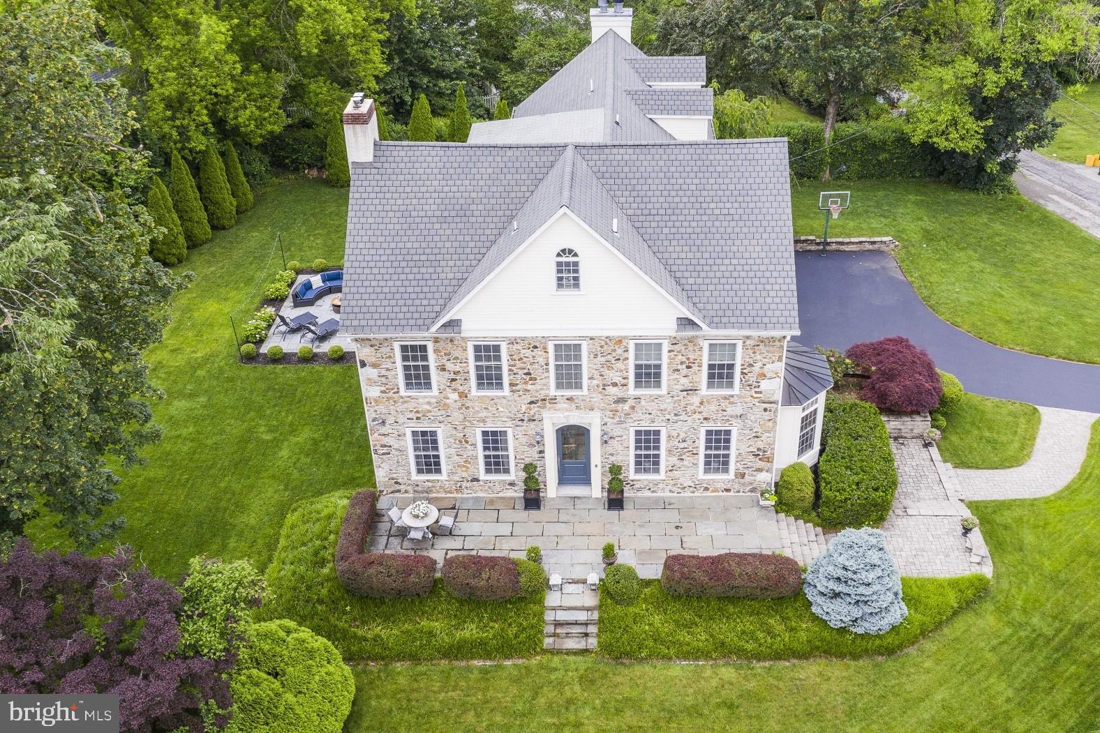 Unbelievable opportunity to own a piece of historic treasure in the heart of Radnor. This 133 year old home beautifully combines the exquisite details of an historic home with the advantage of an updated open floor plan. Spectacular amenities include the original staircase with mahogany and cherry handrail and balusters, 24" deep windowsills, exquisite custom moldings throughout, divided light Marvin historic series windows , 9'10" ceilings on the first floor, 4" wide Brazilian cherry hardwood floors on the first floor. Exceptional formal living room features spacious and bright room with custom millwork include triple crown molding, original wood burning fireplace with marble surround and hearth and oversized carved wood mantle and ornate carved pediment mantel with dental detail, an antique silver finished pendant chandelier, wall sconces with crystals & recessed lighting. Stunning large formal dining room offers triple window that allows for natural light to fill this gorgeous room. Triple crown molding , antique silver finished twelve arm chandelier lighting with restored ceiling medallion & true divided light pocket doors. Custom chef's kitchen with upgraded appliances, wood beams, glass divided light pocket doors, a large pantry, center island, & a very spacious, open and bright family room with gas fireplace that opens to the side yard with expansive deck & steps to a gorgeous patio surrounded by mature landscaping. This wonderful home continues onto the 2nd & 3rd floors with 6 bedrooms & 4 full bathrooms. French doors at the top of the stair open to a luxurious master suite offering his/her outfitted closets by California Closets & sumptuous master bathroom with free standing Kohler soaking tub, Carrera marble shower & double vanity . The master bedroom is wonderfully spacious & bright bedroom with tray ceiling & raised hearth gas fireplace with Carrera marble surround. 3 bedrooms & the laundry room are also on the 2nd floor and are served by 2 hallway full bathrooms. The 3rd floor offers 2 bedrooms & a large full bathroom. The lower level is partially finished with carpeting, light fixtures, a tv viewing area, bar area and large walk-in storage closet. A 2-car attached garage opens to the lower level & features an outlet for an electric car. Exterior features include cobblestone & blue stone stairs to an oversized flagstone front porch with steps down to the beautifully landscaped level front grounds & views of the estate, professionally landscaped grounds with mature plantings, Pennsylvania farm stone facade, composite deck & upgraded patio surrounded by mature landscaping, expansive driveway with inground basketball hoop & lighting, and garage with copper overhang. Old world charm & updated active family living are both served in this exquisite home filled with history. This property provides serenity & seclusion with the convenience of being minutes from major roadways. the airport, walking proximity to the Radnor train station, 333 Belrose restaurant & the town of Wayne with more restaurants & shops. Please note that Delaware County is conducting a real estate tax reassessment, effective January 1, 2021. If you have any questions or concerns, please contact the Delaware County Treasurer's Office or call the Tax Reassessment Hotline at 610-891-5695. Public Records lists 2 properties as 350 Belrose Lane, this is incorrect, along with other misrepresentations on pubic records. See agent for correct information. Listing agent must meet all showing appointments. NO SIGN AT THE PROPERTY.