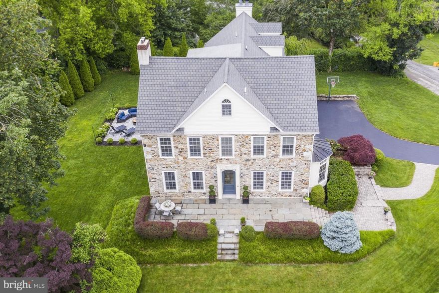 Unbelievable opportunity to own a piece of historic treasure in the heart of Radnor.  This 133 year old home beautifully combines the exquisite details of an historic home with the advantage of an updated open floor plan. Spectacular amenities include the original staircase with mahogany and cherry handrail and balusters, 24" deep windowsills, exquisite custom moldings throughout, divided light Marvin historic series windows , 9'10" ceilings on the first floor, 4" wide Brazilian cherry hardwood floors on the first floor. Exceptional formal living room features  spacious and bright room with custom millwork include triple crown molding, original wood burning fireplace with marble surround and hearth and oversized carved wood mantle and ornate carved pediment mantel with dental detail, an antique silver finished pendant chandelier, wall sconces with crystals & recessed lighting. Stunning large formal dining room offers  triple window that allows for natural light to fill this gorgeous room. Triple crown molding , antique silver finished twelve arm chandelier lighting  with restored ceiling medallion & true divided light pocket doors. Custom chef's kitchen with upgraded appliances, wood beams, glass divided light pocket doors, a large pantry, center island, & a very spacious, open and bright family room with gas fireplace that opens to the side yard with expansive deck & steps to a gorgeous patio surrounded by mature landscaping. This wonderful home continues onto the 2nd & 3rd floors with 6 bedrooms & 4 full bathrooms. French doors at the top of the stair open to a luxurious master suite offering his/her outfitted closets by California Closets & sumptuous master bathroom with free standing Kohler soaking tub, Carrera marble shower & double vanity . The master bedroom is wonderfully spacious & bright bedroom with tray ceiling & raised hearth gas fireplace with Carrera marble surround. 3 bedrooms & the laundry room are also on the 2nd floor and are served by 2 hallway full bathrooms.  The 3rd floor offers 2 bedrooms & a large full bathroom. The lower level is partially finished with carpeting, light fixtures, a tv viewing area, bar area and large walk-in storage closet. A 2-car attached garage opens to the lower level & features an outlet for an electric car. Exterior features include cobblestone & blue stone stairs to an oversized flagstone front porch with steps down to the beautifully landscaped level front grounds & views of the estate, professionally landscaped grounds with mature plantings, Pennsylvania farm stone  facade, composite deck & upgraded patio surrounded by mature landscaping, expansive driveway with inground basketball hoop & lighting, and garage with copper overhang. Old world charm & updated active family living are both served in this exquisite home filled with history. This property provides serenity & seclusion with the convenience of being minutes from major roadways. the airport,  walking proximity to the Radnor train station, 333 Belrose restaurant & the town of Wayne with more restaurants & shops.  Please note that Delaware County is conducting a real estate tax reassessment, effective January 1, 2021. If you have any questions or concerns, please  contact the Delaware County Treasurer's Office or call the Tax Reassessment Hotline at 610-891-5695.  Public Records lists 2 properties as 350 Belrose Lane, this is incorrect, along with other misrepresentations on pubic records. See agent for correct information.  Listing agent must meet all showing appointments. NO SIGN AT THE PROPERTY.