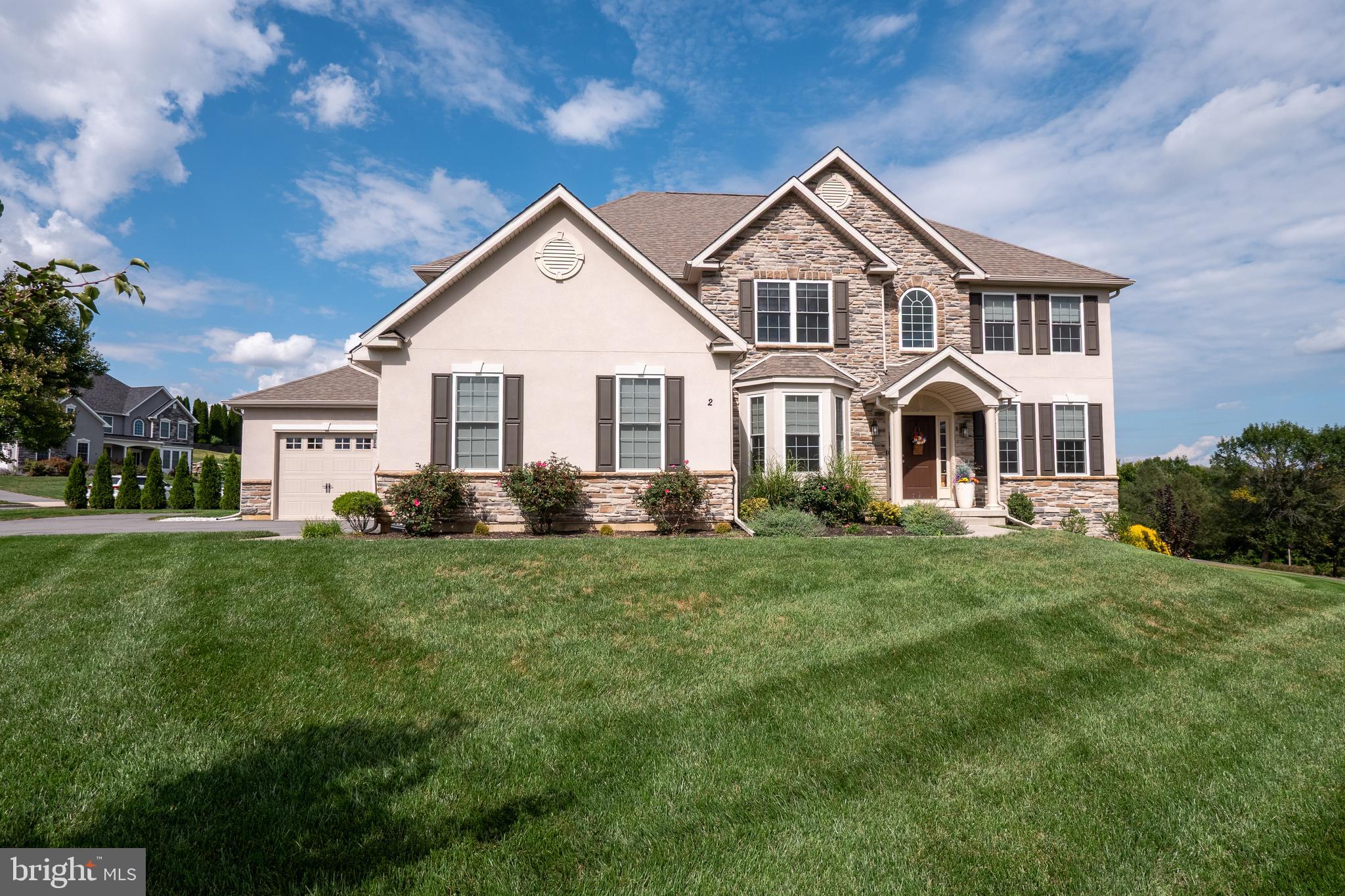 Welcome to this SPACIOUS and BEAUTIFULLY maintained 4 BED, 3.5 BATH home located on a desirable CORNER LOT in the sought-after PARKVIEW ESTATES community in PALMER TWP. This inviting residence offers a FUNCTIONAL and open layout with GLEAMING HARDWOOD FLOORS throughout much of the main level. The TWO STORY FOYER invites you into an open, airy atmosphere. The FORMAL DINING room is GLOWING with natural light from the large BAY WINDOW. A GAS FIREPLACE adds warmth and charm to the family room—perfect for COZY EVENINGS at home. The SPACIOUS kitchen with QUARTZ COUNTERTOPS, CUSTOM CABINETS, LARGE CENTER ISLAND connects seamlessly to the living areas, creating a CENTRAL HUB for family life and gatherings. The main level is complete with a HOME OFFICE, half bath, laundry/mudroom that connects right to the 3 CAR GARAGE. Upstairs, enter through DOUBLE DOORS to the Primary SUITE including 2 WALK-IN CLOSETS and an EN-SUITE BATH. Three additional bedrooms and two full baths upstairs provide COMFORT and PRIVACY for everyone. The unfinished basement offers ENDLESS POTENTIAL for future living space, home gym, or media room. While the backyard is compact, the EXPANSIVE side and front yard space is ideal for outdoor activities, play, and future landscaping dreams. All of this is located in a PEACEFUL, well established Palmer TWP neighborhood, close to shopping, restaurants, and commuter routes.
