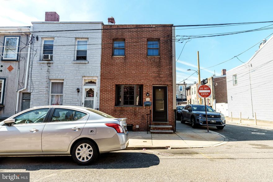 Welcome to 140 Fernon Street, a beautifully maintained corner property nestled on a picturesque block in the heart of the thriving Pennsport neighborhood. This sunlit residence seamlessly blends timeless charm with modern updates, offering a warm and inviting atmosphere for its next homeowner.

Upon entry, you’re greeted by sun-drenched spaces adorned with meticulously restored original hardwood floors and intricate woodwork, exuding timeless charm. The kitchen is a culinary delight, featuring brand-new stainless steel appliances, granite countertops, solid wood cabinetry, and stylish brick-patterned tile flooring that adds a touch of rustic elegance.

Ascend the original staircase to discover continued craftsmanship in the preserved woodwork and hardwood floors. The spacious front bedroom offers ample closet space, while the rear bedroom provides direct access to a large private deck—perfect for entertaining or enjoying tranquil outdoor moments. 

Additional highlights include brand-new central A/C and a freshly parged basement offering excellent storage potential.

Ideally located just minutes from major highways and Philadelphia’s sports complexes, this home offers unparalleled convenience. Enjoy walkable access to local parks, restaurants, bars, Acme, Target, and more. Experience the perfect blend of comfort, convenience, and vibrant city living—Pennsport truly has it all