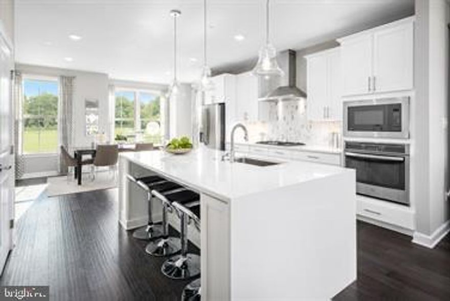 THIS HOME IS TO BE BUILT!  NEW CONSTRUCTION! This NV Homes Van Dorn  marries the convenience of townhome living with the luxury of single family amenities into one great house that you'll love to call home! Enter into the main level with a Family Room and Half Bath, perfect for weekend visitors!  A two car rear garage means you never have to worry about parking again. The main living level is open plan and welcoming. A large kitchen island provides seating and functions as a command center for the home, letting you cook while never missing a minute with family or guests. The SkyLanai covered porch is truly another living space, cozy and secluded while still protected to allow you to enjoy the outdoors, no matter what Mother Nature throws at you. The formal dining area rounds out this level along with a handy coat closet and powder room. Upstairs the grandeur continues with a magnificent owner's suite that features a huge closet, dual vanity bathroom and a Roman Shower. The secondary bedrooms are large and have plenty of storage - there's even a storage closet off the hall for even more space. The coveted second-floor laundry room is right outside the owner's suite for maximum convenience. Note: Photos are of a Finished Model Home - This Home is Under Construction!!