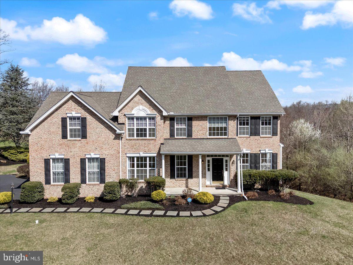 Welcome to this spectacular Arlington Model built by Benson Companies, the largest model with expanded breakfast room, family room and bedroom in sought-after Valleybrooke Chase. Situated on a premium .4-acre lot, this home is surrounded by protected open space on two sides, offering unparalleled privacy and tranquility.
Inside, you'll find an extensive list of high-quality upgrades, including triple crown molding on the first floor and upper hallway, diagonal hardwood floors, recessed lighting, recently professionally painted and newer carpet throughout. The grand two-story foyer makes a statement with its stately entrance and elegant stairway.
The formal living room boasts a double bay window, while the dining room is adorned with chair rail detailing and elegant architectural pillars. The expanded gourmet kitchen is a chef’s dream, featuring a massive island, upgraded cabinets, double ovens, gas cooktop, microwave, and a striking paladian window. The vaulted ceiling breakfast room is bathed in natural light from the oversized skylight and sliders to the patio.
The spacious family room offers a gas fireplace with rear stairs to the upper level while the private study features French doors. A powder room and a laundry room with garage access complete the main level.
Upper Level
The luxurious primary suite features a master bedroom with tray ceiling, large sitting room with a gas fireplace, plus a spa-like master bath with double sinks, a soaking tub, and a tiled shower. The second bedroom is huge, with a double closet. The third bedroom includes an attached bonus room and double closet, while the fourth bedroom also has a double closet.
Additional Features
Poured concrete walk-out basement ready for finishing, including 9' walls, sliders, 2 windows and rough-in plumbing for a third bath.
Expansive two-level hardscape patio – perfect for outdoor entertaining
Professionally landscaped yard for added curb appeal
This exquisite home offers the perfect blend of luxury, space, and privacy in a prime location. Don’t miss your chance to make it yours! Conveniently located with easy access to major roads and shopping.