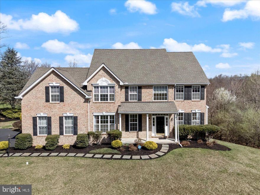 Welcome to this spectacular Arlington Model built by Benson Companies, the largest model with expanded breakfast room, family room and bedroom in sought-after Valleybrooke Chase. Situated on a premium .4-acre lot, this home is surrounded by protected open space on two sides, offering unparalleled privacy and tranquility.

Inside, you'll find an extensive list of high-quality upgrades, including triple crown molding on the first floor and upper hallway, diagonal hardwood floors, recessed lighting, recently professionally painted and newer carpet throughout. The grand two-story foyer makes a statement with its stately entrance and elegant stairway.

The formal living room boasts a double bay window, while the dining room is adorned with chair rail detailing and elegant architectural pillars. The expanded gourmet kitchen is a chef’s dream, featuring a massive island, upgraded cabinets, double ovens, gas cooktop, microwave, and a striking paladian window. The vaulted ceiling breakfast room is bathed in natural light from the oversized skylight and sliders to the patio.

The spacious family room offers a gas fireplace with rear stairs to the upper level while the private study features French doors. A powder room and a laundry room with garage access complete the main level.

Upper Level
The luxurious primary suite features a master bedroom with tray ceiling, large sitting room with a gas fireplace, plus a spa-like master bath with double sinks, a soaking tub, and a tiled shower. The second bedroom is huge, with a double closet. The third bedroom includes an attached bonus room and double closet, while the fourth bedroom also has a double closet.

Additional Features
Poured concrete walk-out basement ready for finishing, including 9' walls, sliders, 2 windows and rough-in plumbing for a third bath.

Expansive two-level hardscape patio – perfect for outdoor entertaining

Professionally landscaped yard for added curb appeal

This exquisite home offers the perfect blend of luxury, space, and privacy in a prime location. Don’t miss your chance to make it yours!  Conveniently located with easy access to major roads and shopping.