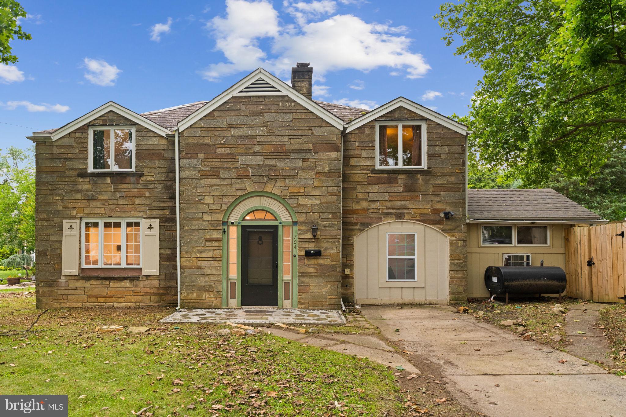 Charming Stone Colonial in the Heart of Emmaus Borough - East Penn School District.
Don’t miss your chance to own this beautiful 4-bedroom, 1.5-bath home perfectly situated on a desirable corner lot in the sought-after East Penn School District with a private fenced-in yard and a covered patio. Step inside to a bright and welcoming living room featuring recessed lighting, fresh neutral paint, and a wood-burning stone fireplace. The spacious dining room continues the theme with fresh paint and natural light, ideal for hosting family and friends. At the heart of the home, the renovated kitchen boasts new cabinetry and counters, stainless steel appliances, a deep sink with a view to the backyard, recessed lighting, and a pantry for added storage. The main level also includes a half bath, a convenient laundry area, and a flexible bonus room—perfect for a home office, playroom, gym, or even a fifth bedroom. The garage was converted into living space, but could easily be converted back into a garage. Upstairs, you’ll find a generously sized primary bedroom along with three additional bedrooms, all sharing a tiled full bathroom. Enjoy the backyard, complete with a covered patio for entertaining, a treehouse for play, and ample space for pets or gardening—all fully fenced for privacy. Features include: Renovated kitchen (2025), fresh paint throughout the main level and hallway steps (2025), new fence, new washer/dryer. Located at the base of South Mountain, this home offers walkable access to hiking trails, parks, the local YMCA, Emmaus High School, and the bustling farmer’s market. Just minutes from shopping, dining, and major commuter routes including I-476 and I-78. Schedule your private showing today!