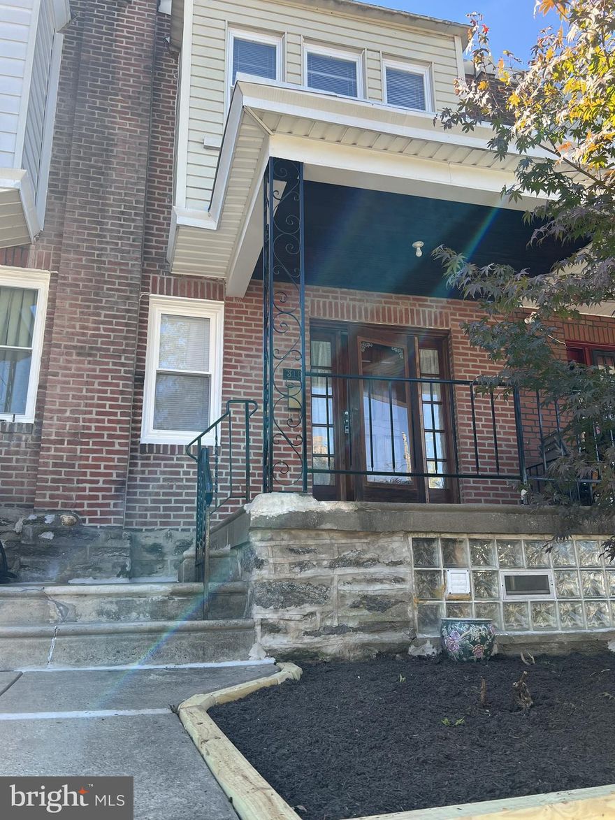 The house has been recently remodeled from top to bottom with 3 bedrooms and a main bathroom all on the 2nd floor, all hardwood flooring, with an open living room space as soon as you walk through the front and a kitchen with dining room behind it. The basement has a big sized ceramic floor and a bar, as well as an additional full bathroom and an exit leading to a driveway in the back of the house. The house has a rubber roof and recently got a new coating and is more than ready for you to move in.