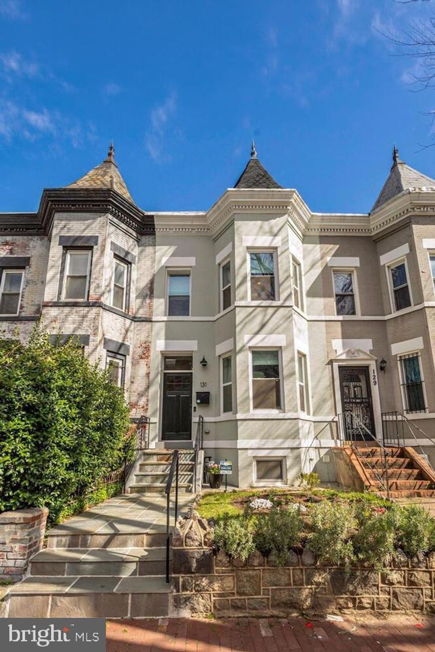 Come home to this stunning 4 bedroom / 3.5 open floor-plan home with exposed brick and gleaming hardwood floors throughout. Historic charm meets modern elegance and convenience! This home was meticulously re-designed in 2017 and also features reclaimed wood from a Historic Shaw Home, and from a Wisconsin barn. The home boasts over 2200 finished square feet that creates a smooth transition from the living room into the kitchen. Cooking and entertaining is a breeze with high end stainless appliances, gas stove, and plenty of cabinet and counter space. You'll also enjoy the deck just off the kitchen, perfect for grilling and outdoor dining. As you progress upstairs, a gracious owners bedroom awaits, complete with an exposed brick wall, vaulted ceiling, and large closet. The private owners' bath features dual sinks and a luxury shower. Two other bedrooms are located upstairs, along with the second full bath. The third bedroom enjoys a private balcony for relaxing. The lower level is fully finished with a living/dining area, legal bedroom, and full bathroom. The lower level has a private entrance making it an ideal au pair/in-law suite. You won't have to worry about parking on the street because this home features a secure parking pad for 2 cars! This home was completely renovated in 2017. Enjoy lots of entertaining and storage space. Ideally located in the heart of DC, shopping, and dining are just steps away.