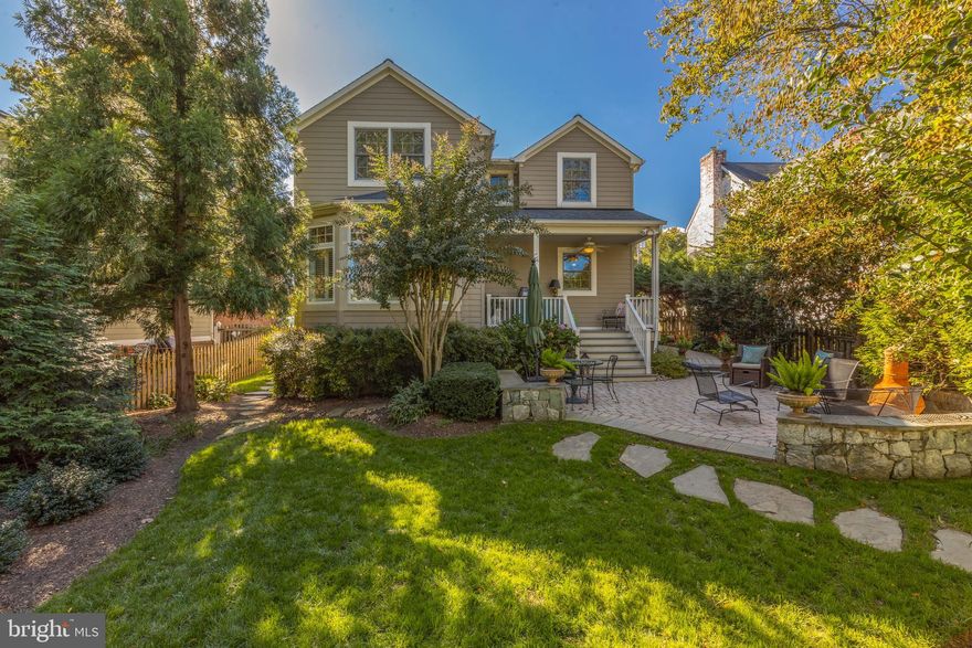 Life has its rewards and many of them are here at 855 Harrison St.   Whether you are inside or outside the recipe for fine living is found here. Solidly built in 1940 and doubled in size in 2003 with an expansive 2-story addition with top of the line amenities makes this a hard to duplicate home.   The true chef's kitchen  with custom cabinetry, stainless steel appliances, 2 ovens and center island functions well for those who entertain and is ever so spacious for all those who want to help! The  family room with a casual dining area access to a  private porch overlook the  MAGNIFICENT fenced yard.   I am not exaggerating. If you are looking for a real back yard...flat, private, professionally landscaped including lighting, underground irrigation system plus extensive hardscape with  room for a pool, a place to play ball apart from the entertaining patio and grilling station  you will find that here.  It is all done to perfection!  Back to inside where you will find a formal living room with wood burning fireplace, a formal dining room and a home office...all part of the original home. Upstairs are 4 BIG bedrooms, with custom built-ins and custom closets. The primary bedroom with spa bath has a large walk-in closet.  Quality for years to come. The recently remodeled lower level is the place for movies and relaxing. New half bath and storage galore.   Some popular features are: the laundry room  is on the main level, there are shutters and blinds throughout the home,  there is an alarm system, the driveway is a very pretty concrete aggregate . All this and metro accessible as well. Gem of a home!! The  BLUEMONT neighborhood has just been voted one of the best places to live in Virginia! *** when looking at the tax assessment, please know it does NOT include the addition of the kitchen extension, family room, primary bedroom suite.***