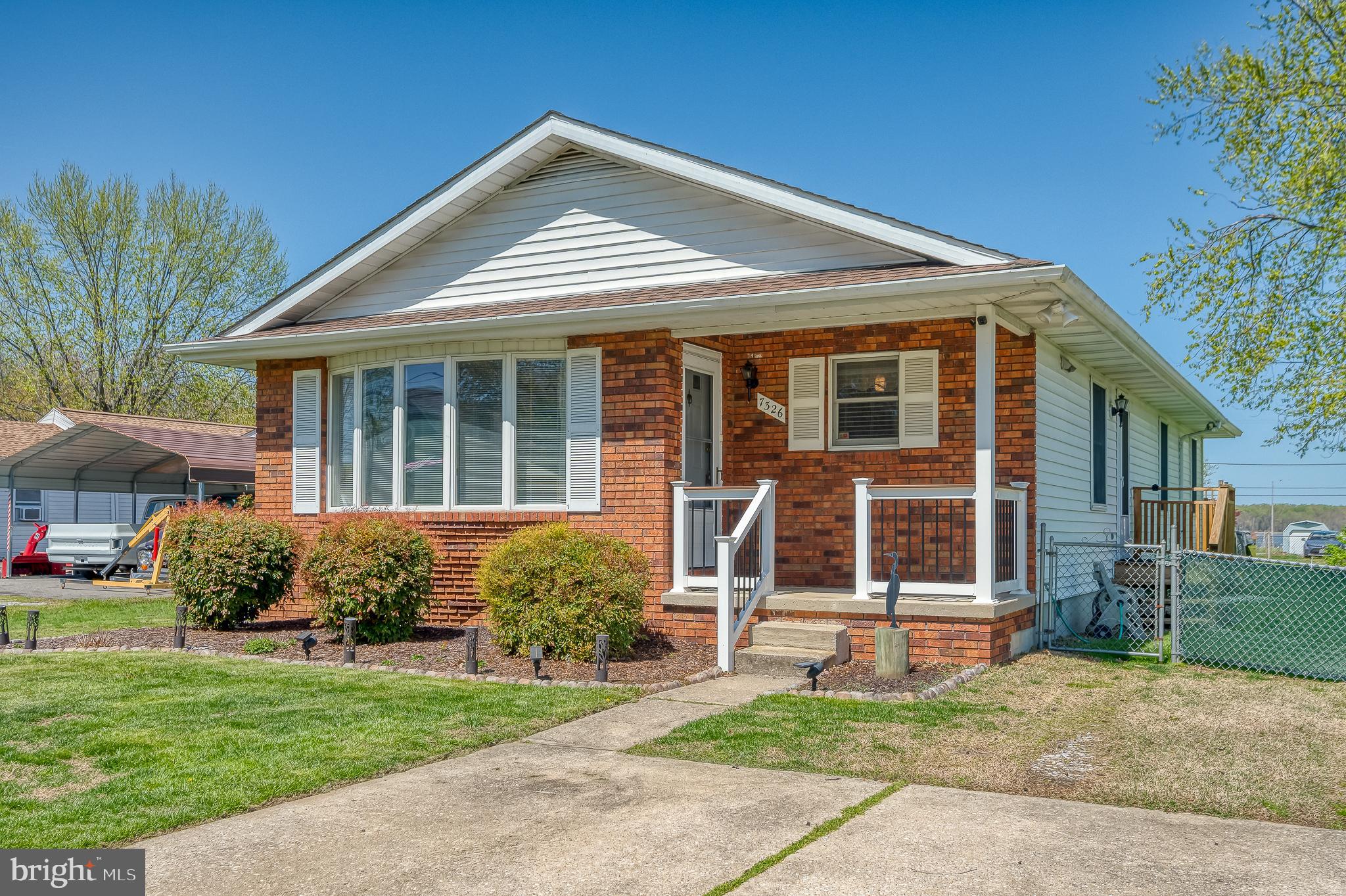 Charming 3-bedroom, 2-bath rancher offering 1,364 square feet of single-level living in the water-oriented Oliver Beach community of Middle River. Features include luxury vinyl plank flooring throughout the living, dining, and kitchen areas, stainless steel appliances, quartz countertops, and a hall bath updated in 2022. All appliances were replaced in 2022. An above-ground pool is included as-is, adding outdoor enjoyment to this comfortable and well-maintained home.