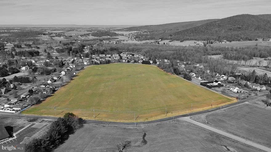 Welcome to a prime investment opportunity in the heart of Waynesboro, where 30 acres of pristine land awaits your vision. This expansive parcel, zoned for medium density residential housing, presents an ideal canvas for a thriving community development project. With a meticulously crafted 30-acre development plan for 101 duplex lots, this property is poised to accommodate a vibrant residential community (in the final stages of approval). Each duplex lot provides the perfect balance of privacy and community living, catering to the modern homeowner's needs. Additionally, two lots totaling 10 acres are zoned for neighborhood commercial use, opening up exciting possibilities for retail establishments, dining venues, or other commercial ventures. Notably, the neighborhood commercial zoning also allows for the establishment of assisted living facilities, catering to the needs of aging populations and providing essential services within the community. Conversion possible to R2 zoning for additional residential duplex units. Enjoy the convenience of access to public water, sewer, and natural gas, streamlining the development process and ensuring efficient utility access for residents and businesses alike. Nestled in a highly sought-after location, this development offers unparalleled convenience to amenities, including shopping, schools, parks, and recreational facilities. Residents will appreciate easy access to everyday necessities and recreational opportunities, enhancing the quality of life within the community. Benefit of PA tax exemption for retirees, no state tax on retirement income. Nestled amidst the picturesque landscape of the Cumberland Valley, Green Ridge Farms boasts breathtaking mountain views. Strategically situated just minutes from the Maryland border and approximately 90 minutes from both Baltimore and Washington D.C., this development offers the perfect balance of seclusion and accessibility. Residents can enjoy the serenity of rural life while still being within reach of major metropolitan areas. Immerse yourself in the serene beauty of the Michaux State Forest, which envelops Green Ridge Farms, providing residents with endless opportunities for outdoor recreation and exploration. Additionally, the legendary Appalachian Trail lies less than half a mile away, inviting residents to embark on unforgettable hiking adventures. Waynesboro is designated “Appalachian Trail Town”. Indulge in leisurely rounds of golf at multiple nearby courses, including the prestigious Waynesboro Country Club, offering private amenities such as golf, tennis, dining, and swimming—all just minutes away. Experience the thrill of winter sports at Ski Liberty and Whitetail Resorts, both conveniently located nearby and owned by Vail Resorts, ensuring world-class skiing and snowboarding adventures during the winter months. An ideal canvas for the future of assisted living facilities. This property offers a blank slate for crafting a tailored environment that meets the evolving needs of residents requiring assistance. Situated in a desirable location, this parcel of land presents endless possibilities for creating a purpose-built community that prioritizes comfort, accessibility, and inclusivity. With ample space for thoughtful design and innovative amenities, envision a residence that fosters independence and well-being for all who call it home. From spacious layouts to customizable features, every detail can be curated to ensure a seamless transition into a welcoming and supportive environment. This meticulously planned development presents a compelling investment opportunity, poised to capitalize on the growing demand for residential and commercial properties in Waynesboro. With its strategic location, thoughtful design, and access to essential infrastructure, this property holds immense potential for investors seeking to make a lasting impact in the real estate market.