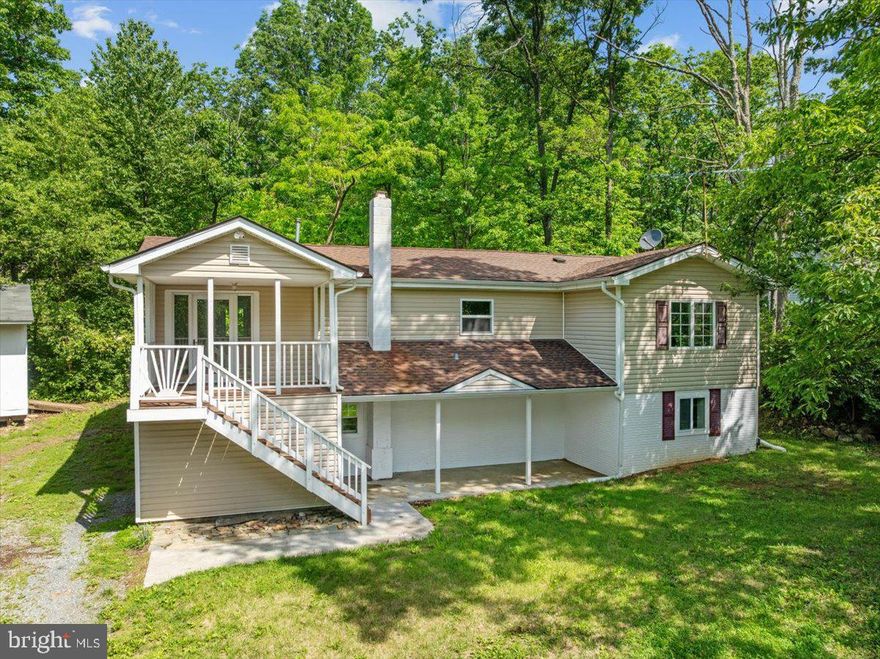 Welcome to your own spot on Great North Mountain. This fully renovated home in Shawneeland offers the kind of space, freedom, and natural setting that’s getting harder to find. It sits on two separate parcels totaling 0.68 acres, giving you breathing room and flexibility for the future. Whether you want a larger yard, extra privacy, or room for something else down the line, you’ve got it.<br><br>
The house was fully renovated in 2022: roof, siding, windows, HVAC, kitchen, bathrooms, and flooring. The hot water heater and washer were replaced in 2024. In other words, the major updates are done. It’s move-in ready without the usual list of “someday” projects.<br><br>
Inside, the layout is simple and open, with natural light throughout. Step outside and you’re in the woods, with the kind of quiet that just doesn’t come with close neighbors. And while it feels tucked away, you’re only 15 minutes from Winchester Medical Center and about 20 minutes from downtown Winchester. It’s quiet, but not isolated.<br>
One of the best things about living here is the access to the community lake and several ponds. You can swim, fish, canoe, or just sit on the beach and unwind. There are also playgrounds nearby and a well-loved farmers market just a short drive away.<br>There’s no HOA. Shawneeland is a sanitary district managed by Frederick County, with an annual fee that covers road maintenance and access to the trash and recycling center on Shawnee Trail. Xfinity internet is available. The house lot has an existing well and septic system, and both parcels qualify for public water hookup through Aqua if you ever want to build or connect later.<br><br>
It’s hard to explain what living here feels like until you do it. Morning walks where the only sound is the wind in the trees. Evenings where the stars are actually visible. A little more space. A little quieter. A little more breathing room.<br>
That’s what this place offers. If that sounds like the kind of setting you’ve been looking for, come take a look