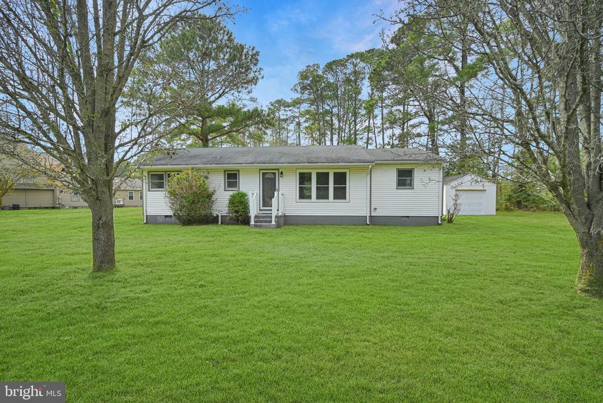 Nestled on 0.86 acres in the waterfront community of Crisfield, MD, this renovated and spacious 1356 sqft home offers a large living room with dining area, 3 comfortable sized bedrooms, 1 bathroom that offers a shower/bathtub combo, and laundry area equipped with a front loading washer and dryer. Outside, you'll find a detached 1-car garage that can be used as a garage or storage. Enjoy the nature around you with plenty of space for gardening with this large lot. This home is outside of city limits and has a newer well along with public sewer. Come take a look at this home and see if it's everything your heart desires.