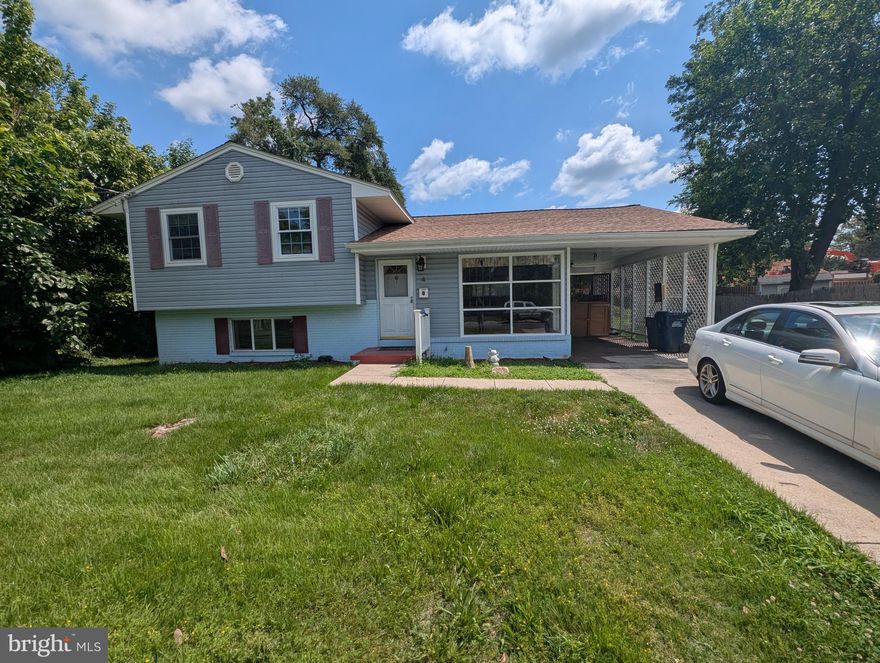 This property is going to go fast—schedule your showing ASAP! Offers will be presented as they come in, so don't wait to make your move. Welcome to 4 Lakecrest Circle, Greenbelt, MD 20770—a spacious split-level home located in the desirable Lakecrest neighborhood. This 5-bedroom, 3-bathroom residence offers a practical layout and generous living space in a highly convenient location. As you enter, you're greeted by a light-filled living room that flows into a dining area—ideal for gatherings. To the right, the kitchen provides a functional layout for everyday cooking and entertaining.

Upstairs, you’ll find three well-sized bedrooms, including a primary suite with its own private full bath. A second full bathroom serves the other two bedrooms on this level. The lower level features two additional bedrooms and another full bathroom, offering flexibility for guests, a home office, or multi-generational living. The utility area also includes a kitchenette with granite countertops, a cooktop, and tile flooring—great for extended stays or separate living needs.

Set on a 0.25-acre lot, the property includes an attached carport, private driveway, and additional street parking. Located just steps from public transportation, it offers quick access to I-495, the Baltimore-Washington Parkway, NASA, UMD, and nearby shopping and parks. Additional highlights include wood flooring on the main levels, central A/C, and a fully finished walkout basement.

While the home could use some cosmetic updates, it's a solid property at a competitive price. Most of the work appears to be surface-level—fresh paint, minor touch-ups, and a bit of creativity will go a long way. Bring your brushes and your vision, and you’ll have a fantastic home with great potential in an ideal location.