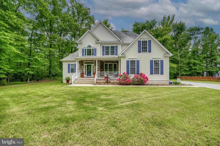 Welcome to this Absolutely Gorgeous Custom-built home that sits on .41 acres and backs to
trees. There is over 3,100 sq. foot of finished living area and a two-car attached garage. This
is not your cookie cutter home!  This home is located in the Bowleys Quarters Area, near the water and great waterfront restaurants. 
There have been many updates in the past 3 years. This home boasts of 5 Bedroom and 3 Full
baths and is ADA accessible. This home has been professionally painted throughout with 10-
foot ceilings and hardwood floors on the  1st floor.
The open concept gives this home such a warm feeling. You can tell how much this home is
loved and well taken care of.
The foyer and family room are 2 stories with a gas fireplace.
The kitchen has 40’’ cabinets, wall oven, built in microwave and quartz countertops with
beautiful backsplash and breakfast nook.
There is a separate dining area. 
The Primary Bedroom and Luxury Primary bath are on the 1st level. The Primary bedroom has
tray ceiling and walk in closets. The tray ceilings are very elegant looking. The bath has a jetted
tub, for those relaxing evenings, separate shower and double sinks. The vaulted ceilings are
very impressive. The home is equipped with a tankless water heater so you will not run out of
hot water while you are relaxing in your jetted tub.
There is also a second bedroom and full bath on the 1st level.
The laundry room is located on the 1st level for your convenience. The washer and dryer were
new in 2023.
The second level has 3 spacious bedrooms and a Jack and Jill bathroom. The 3rd bedroom also has a sitting rom.
There is a 4-foot crawl space that has been newly insulated.
There is a new gutter system with gutter guard replacement in 2023.
This is a very well cared for and beautiful home and all you need to do is move right in. You will be impressed. No flood insurance required.