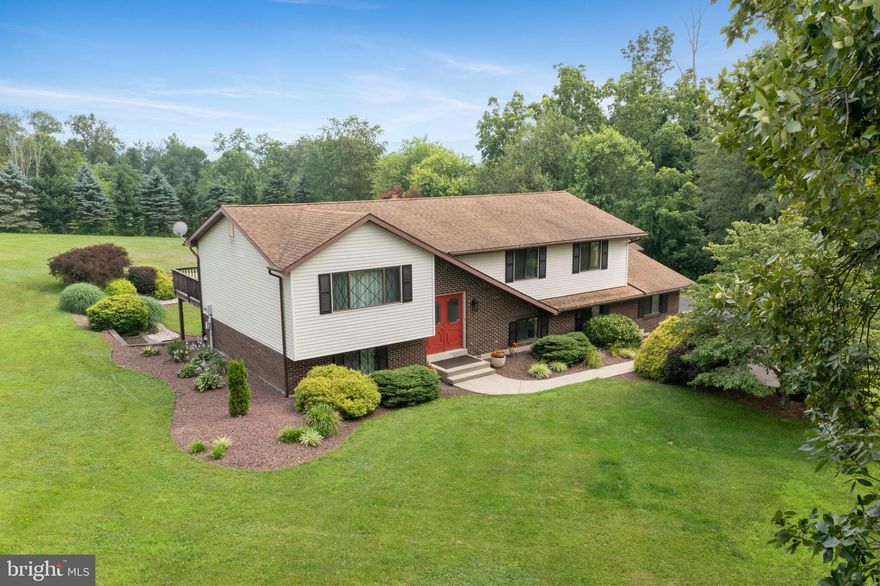 **Multiple Offers received. Highest and Best due by Monday evening, July 31st, at 10pm. Discover this charming bi-level home nestled in the tranquil countryside of New Tripoli, PA. With 4 bedrooms and 2.5 baths, this retreat offers the perfect blend of space and comfort. Escape the hustle and bustle and embrace the serenity of over an acre of land surrounding your new abode. Unwind in the expansive yard, perfect for gardening, play, or simply soaking in nature's beauty. Experience the joy of waking up to scenic views and the calming sounds of nature. The generous living space inside and the vast expanse of land outside provide ample room for your family to grow and make cherished memories. Customize the land to suit your desires – whether it's adding a pool, creating a cozy outdoor entertainment area, or building your dream workshop. Don't miss this opportunity to view this home, schedule your showing today.