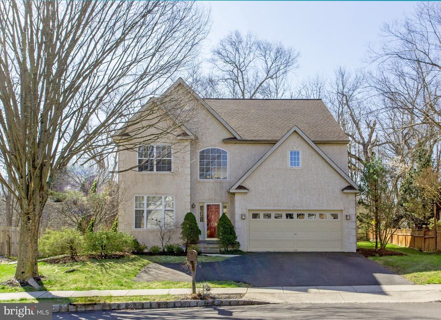 Nestled in the Riverwoods at New Hope community, just a stone's throw from the vibrant heart of New Hope, lies an exceptional residence that epitomizes modern comfort and spacious living. This expansive home, one of the largest in Riverwoods, offers a retreat with fine amenities in a perfect location. Step inside and be greeted by an open, airy layout that seamlessly blends elegance with functionality. The soaring ceilings and magnificent wall of windows in the 2-story family room provide stunning views of the surrounding woodlands. A stone fireplace adds warmth and charm, creating the perfect ambiance for both casual gatherings and formal entertaining. The gourmet kitchen features upgraded stainless steel Viking appliances, a gas range and oven, and a Bosch dishwasher. An island, a built-in desk, recessed lighting, and a spacious pantry complete the space, making it as practical as it is beautiful. The adjacent eating area offers space for a large table and beautiful views of the woods, while a bar seating area provides a more casual dining option. Unwind outside in your own private oasis, complete with a cedar deck, awning, bluestone patio, and fountain. Upstairs, enter the main bedroom suite through French doors opening to a light-filled room with a vaulted ceiling, a sitting area with cathedral ceilings, and a wall of windows overlooking the woods. Double walk-in closets and a bath with soaking tub and separate shower complete the suite. Two additional bedrooms and a full bath, along with a huge loft area that could easily be converted into a fourth bedroom or office, offer plenty of space. The unfinished basement provides ample storage and endless possibilities. Enjoy built-in speakers, a new 2-zone heating system and a 2-car attached garage. With top-rated New Hope-Solebury schools, easy access to Rt. 202 and 295 for commuting, and proximity to all the shops, galleries, and restaurants of New Hope, this home truly offers the best of comfort and style.