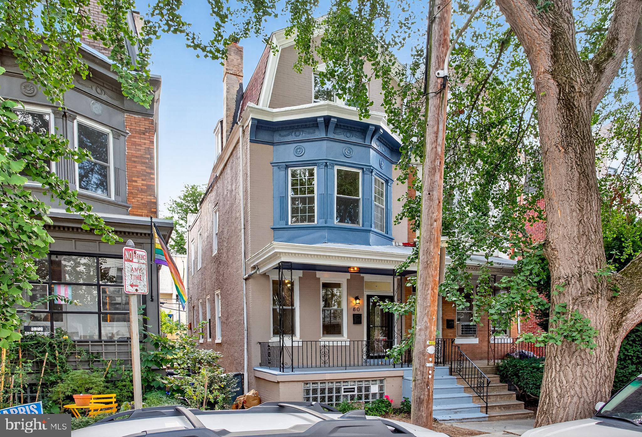 Welcome to 80 W Sharpnack Street — a beautifully updated 4-bedroom, 3.5-bath twin home in the heart of Philadelphia. A few steps lead to a welcoming front porch, the perfect spot to enjoy your morning coffee. Inside, an open-concept layout showcases luxury vinyl plank flooring that flows throughout most of the home. The living room sits at the front with the staircase tucked to the side and bonus storage underneath. Continue through to the dining area, which offers easy access to a stylish powder room with tiled floors. The kitchen is a true showstopper, featuring quartz countertops, a large island with seating and pendant lighting, stainless steel appliances, a 6-burner gas range with hood and pot filler, a farmhouse sink, and a striking tile backsplash — making it both functional and perfect for entertaining. Upstairs, the second level hosts three bedrooms, each with recessed and overhead lighting and one with a bay window, along with a full hall bathroom complete with a double-sink vanity, tub/shower combo, and tile floors — ideal for children or guests. The third level is dedicated to the primary suite, offering a spacious bedroom with recessed lighting and a private bath with tiled floors, a tub/shower combo, and single vanity. The fully finished lower level expands your living space with a family room, recessed lighting, and luxury vinyl plank flooring. A full bathroom with a step-in shower and a unique dog bath adds convenience, while a separate laundry room with tile floors and front-load washer/dryer completes this level. Out back, the private fenced-in patio provides the perfect setting for relaxing or entertaining outdoors. All of this is just steps from Germantown Avenue, with easy access to shopping, dining, and entertainment. Don’t miss your chance to make 80 W Sharpnack Street your new home!