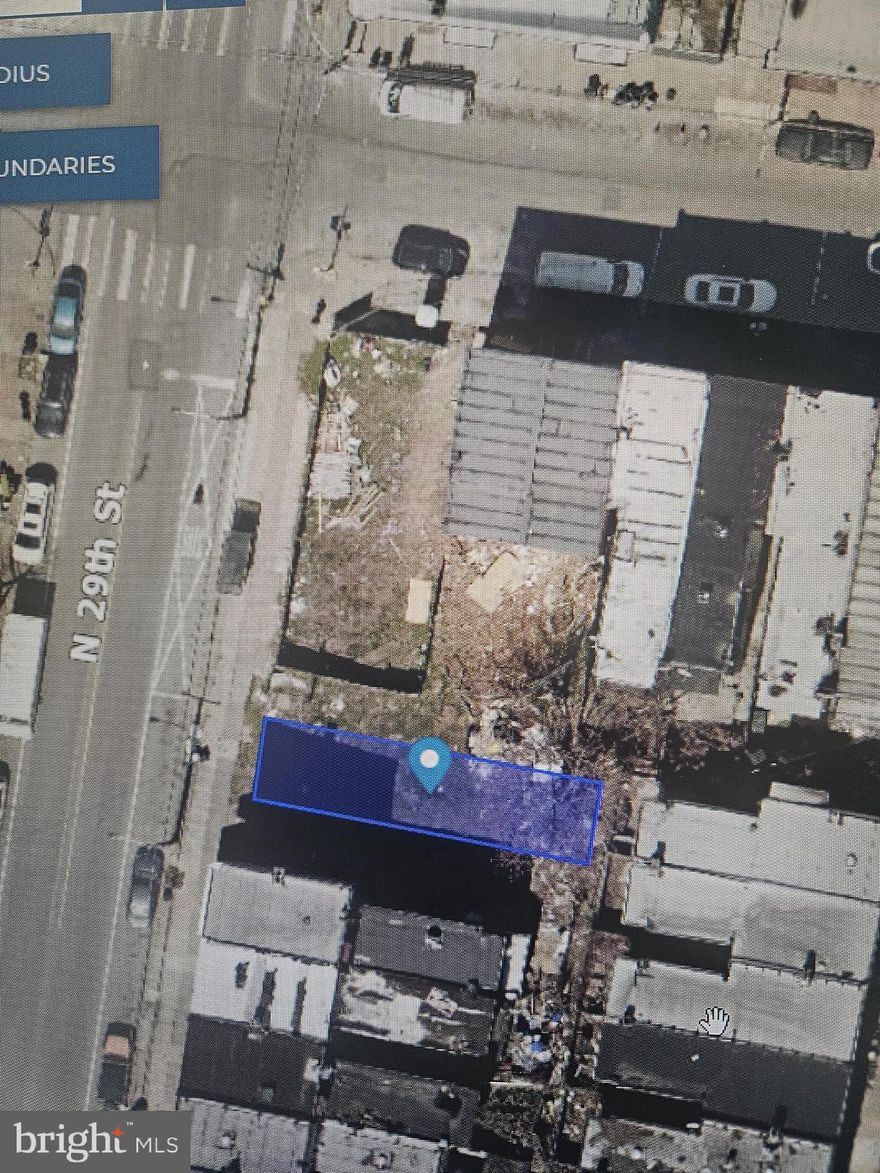 RSA5 Lot located on 29th St Close to Cecil B More. Phila Housing Authority owns to the right of our lot. Our Lot has a 15ft front.