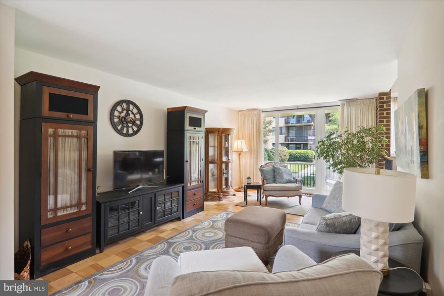 Welcome to this beautifully updated 2-bedroom, 1.5-bath condominium in Americana Finmark. This second-floor unit features an updated gourmet kitchen upscale, custom cabinets, granite countertops, custom backsplash and newer stainless steel appliances. Very spacious sunken living room with interior brick wall, and a floor-to-ceiling sliding glass door leading to the private sunny balcony. Separate dining room. Newer oversized windows throughout and newer sliding glass door. Gorgeous owner’s suite with a huge walk-in closet plus two additional spacious closets and an attached half bath. One additional large bedroom with a walk-in closet and an additional sizable closet. Beautifully updated full bathroom with custom finishes. Gorgeous, re-finished wood floors throughout most of the main living areas. Washer/dryer hook up in unit, plus additional complimentary laundry facilities in the building. New electrical panel (the community will likely be requiring this soon). This unit conveys with a huge storage closet measuring about 5 feet by 8 feet. The condo fee covers everything: heat, air conditioning, gas, electricity, water, laundry facilities, all amenities! Americana Finmark is a gated community situated on over 10 acres, with on-site property management. This community has a lot of amenities: outdoor pool, picnic area with barbeque grills, tennis/pickleball courts, basketball court, tot lot, dog walking area, complimentary laundry facilities, community room and plenty of parking. This home is on the quiet, park-like back side of the community, close to the pool, tennis court and picnic/grill area. This is a commuter’s dream: it is adjacent to the Forest Glen Metro and is just a minutes’ walk away, blocks from the Beltway, and an easy commute to Downtown Silver Spring, Kensington, and Bethesda. This home is just minutes from all the shopping, entertainment, and restaurants available in Downtown Silver Spring, Wheaton, and surrounding areas. Come take a look!